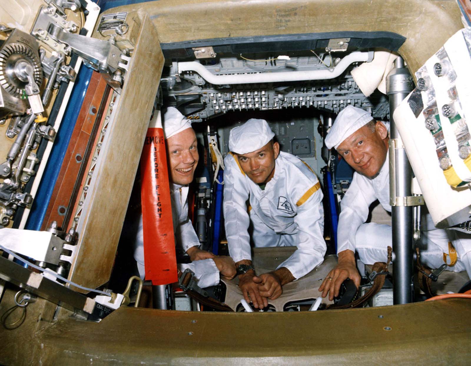 Apollo 11 crew members pose for a photo during a walk-through egress test on June 10, 1969.