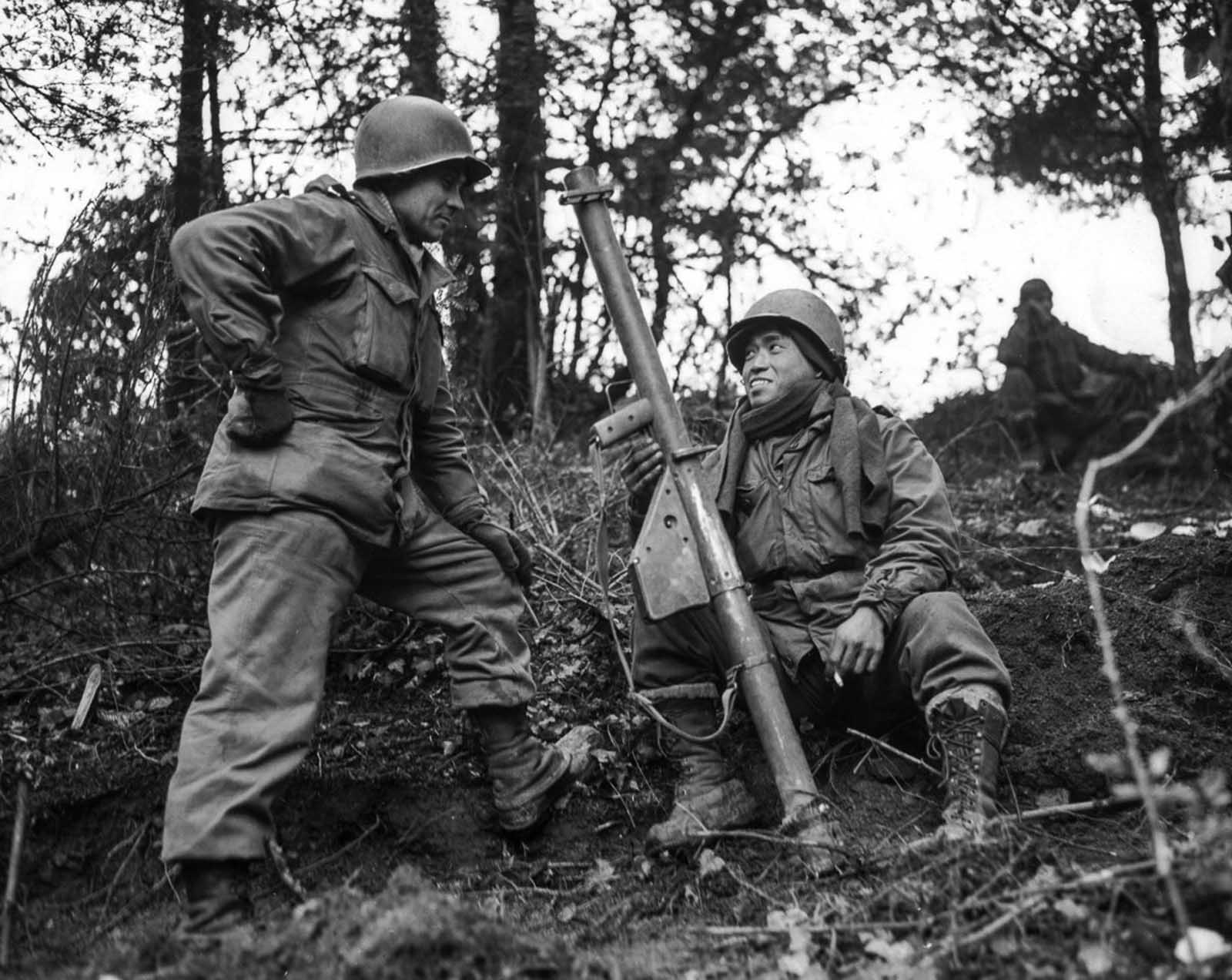 A soldier of the 442nd Regimental Combat Team mans a post near St. Die, France, armed with an antitank rocket launcher. Nov. 17, 1944.