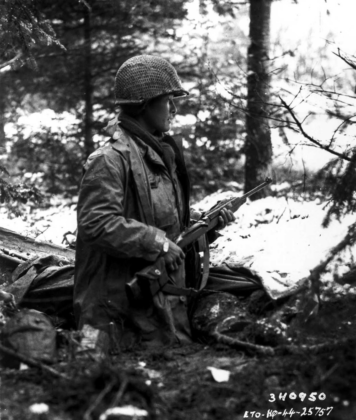 A squad leader of the 442nd watches for German troops in France. November 1944.