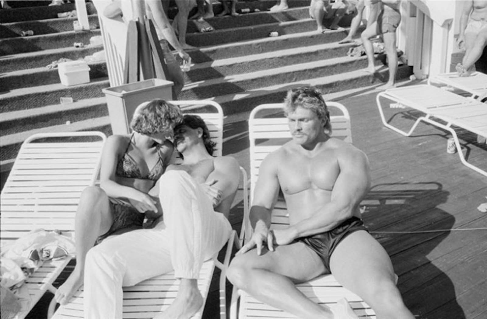 Enjoying the sun. The guy on the right is feeling lonely.