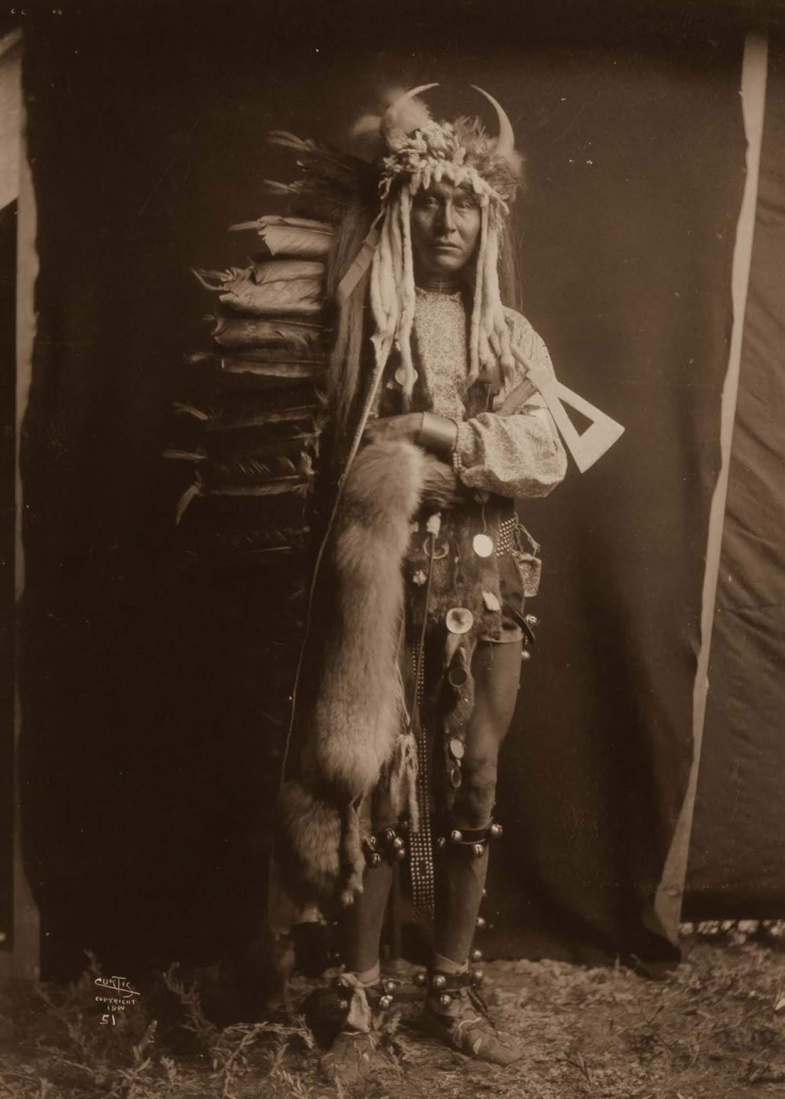 Iron Breast, a Piegan man. 1900.