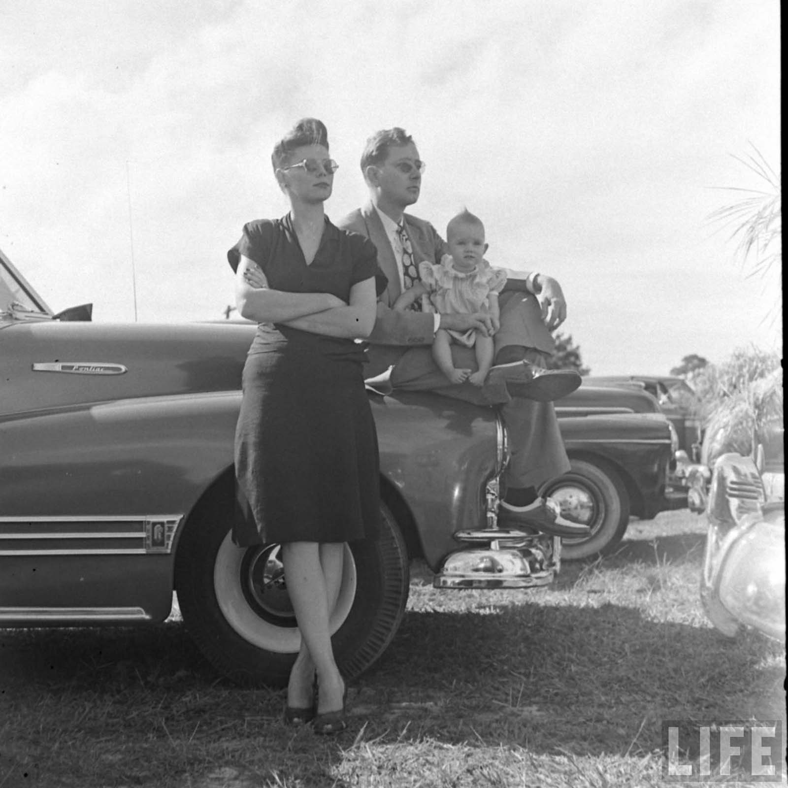 A family in a drive-in church. Florida, 1947.