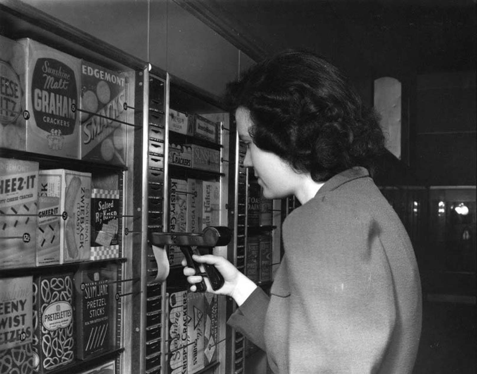 In the snack aisle, a customer uses an updated version of the key.