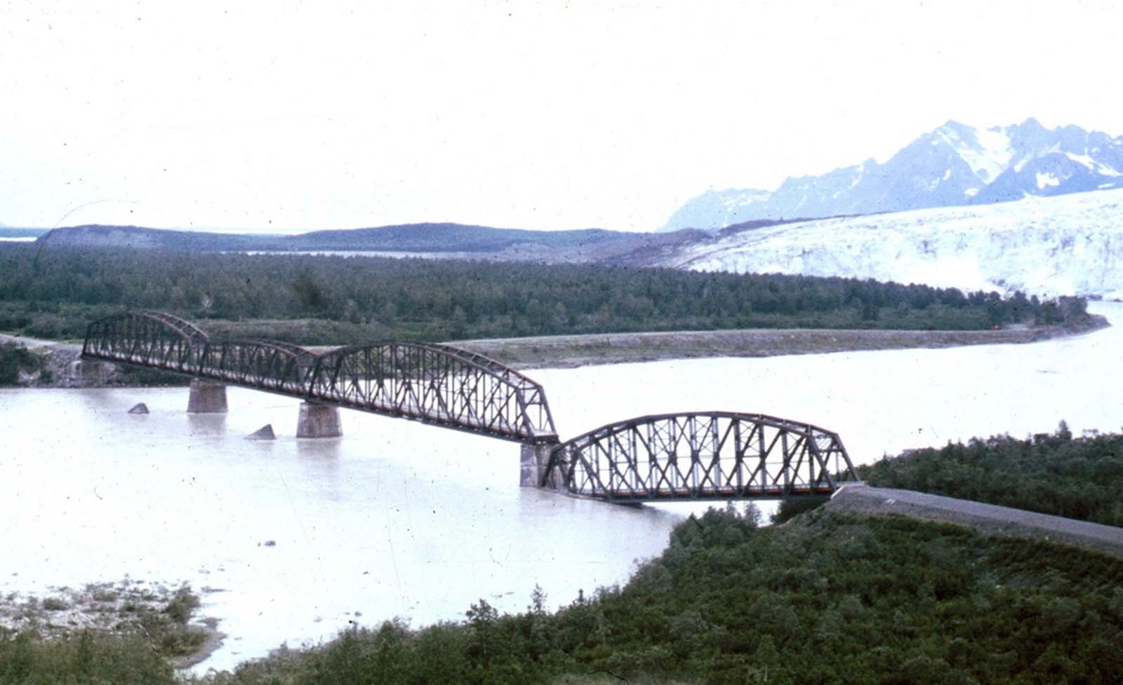 One span of the 'Million Dollar bridge' of the defunct Copper River and Northwestern Railroad was dropped into the Copper River by the earthquake.
