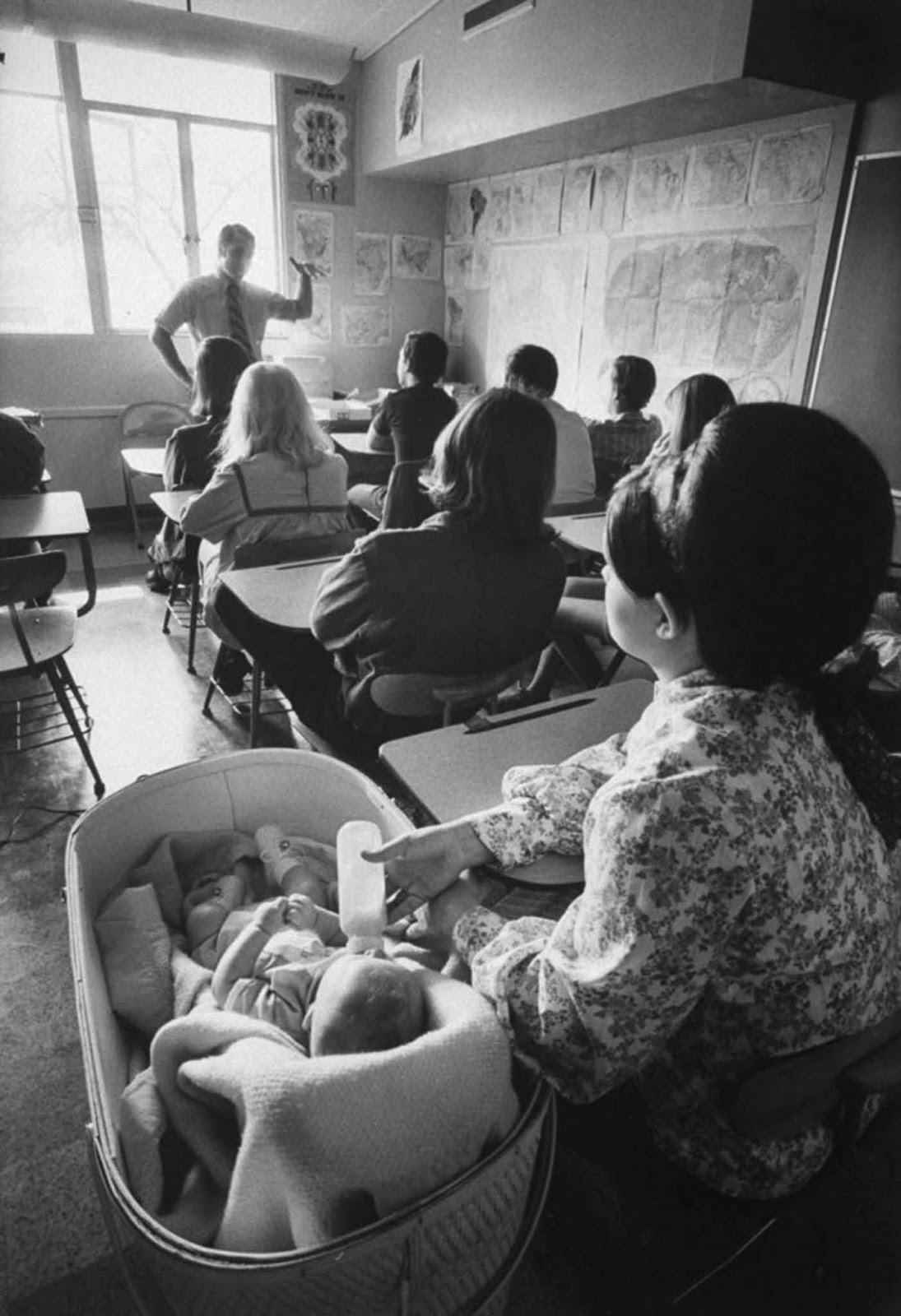 Cheryl Gue, 17, quieted her son Michael with a bottle. Although the sound of crying babies was a normal disruption at Citrus, the more vocal ones were usually hustled out of class. The school was equipped with playpens, cribs and toys. The mothers were required to come to school for the morning child-care courses, but could study academic subjects at home.