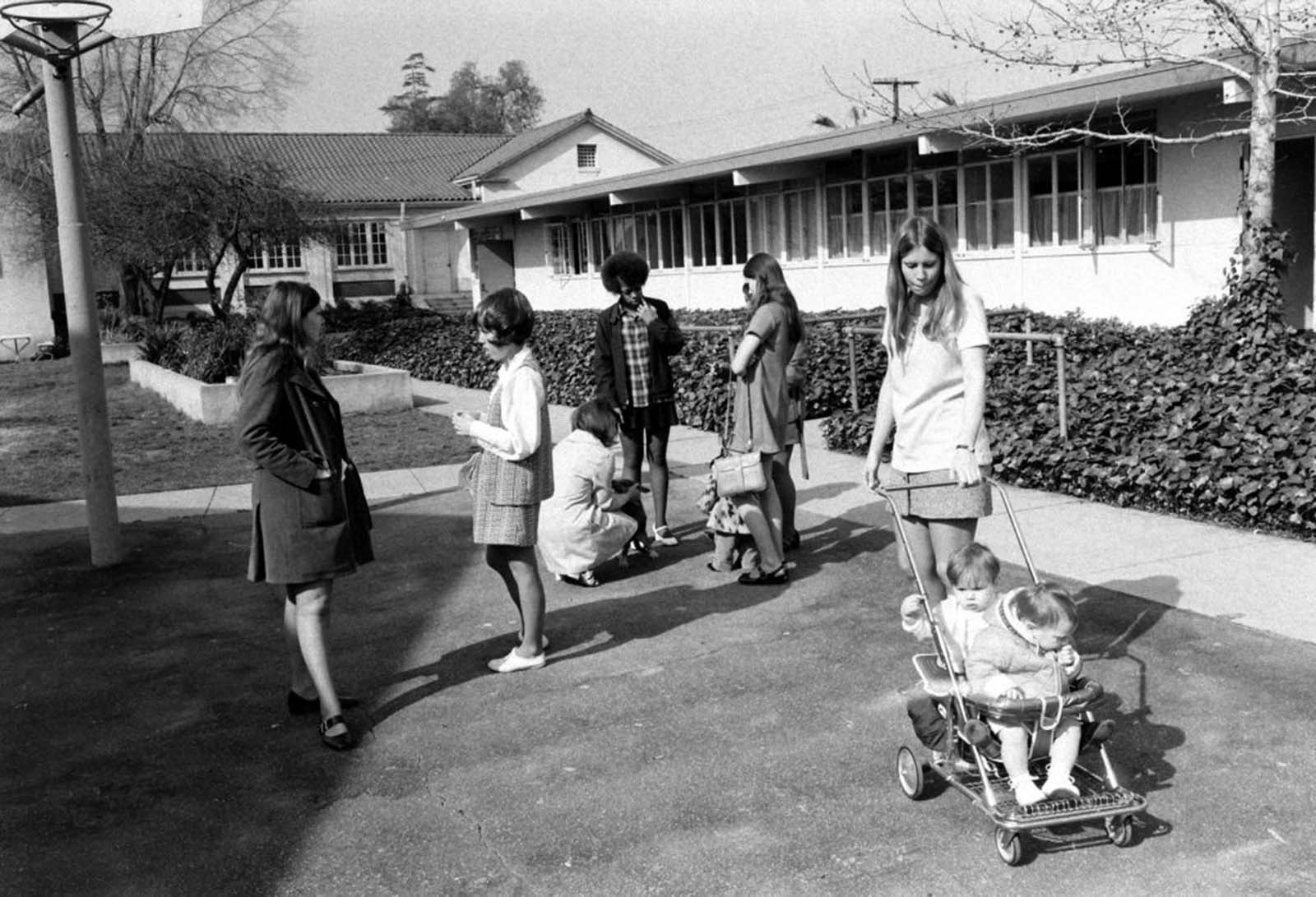 High school students with babies, Azusa, Calif., 1971.