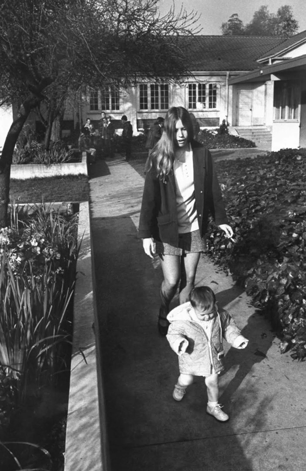 In the courtyard outside the school, Vicki Conger, 17, took a stroll with her 13-month-old daughter, Shawn Michelle.