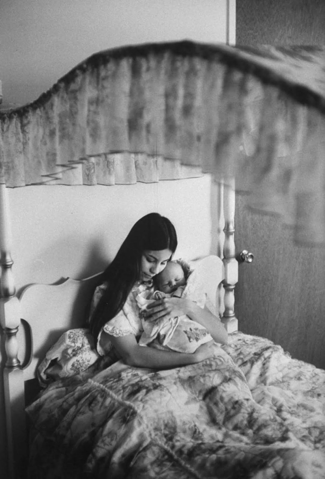 In the canopied bed where she had slept since childhood, Judy cuddled her son Dylan. “My son may have been unplanned,” Judy said, “but he is not unloved.”