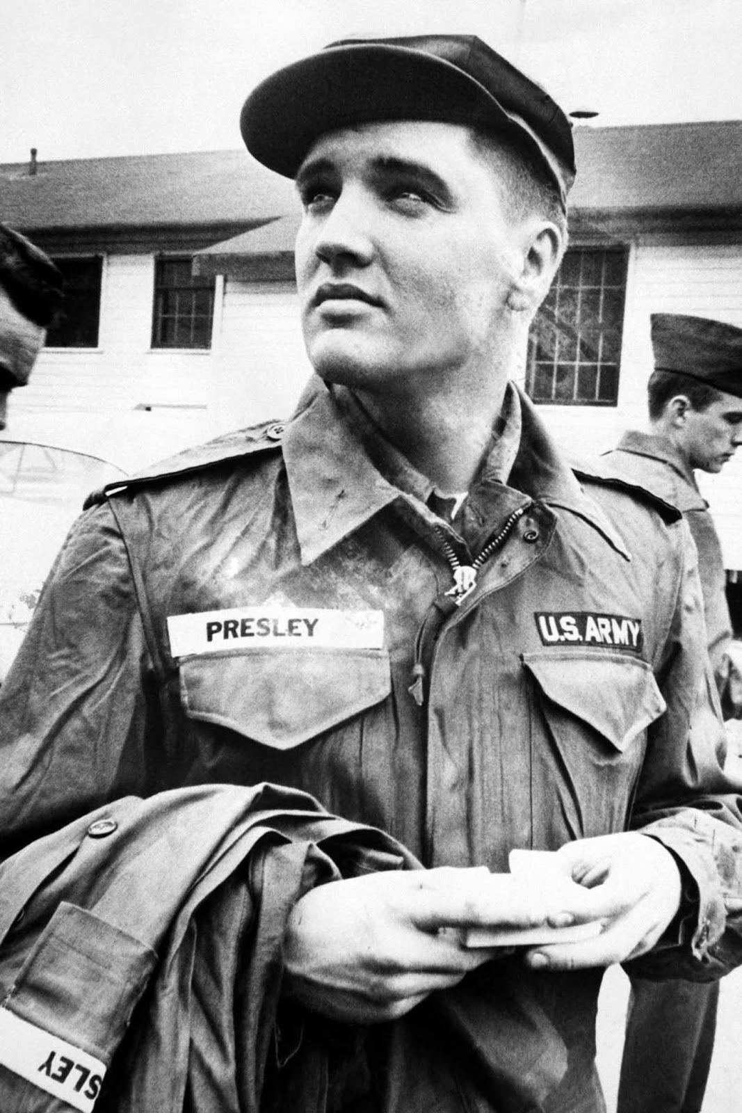 Awaiting issue of more Army clothing at Fort Hood, Texas, for eight weeks of basic training with the Second Armored Division.