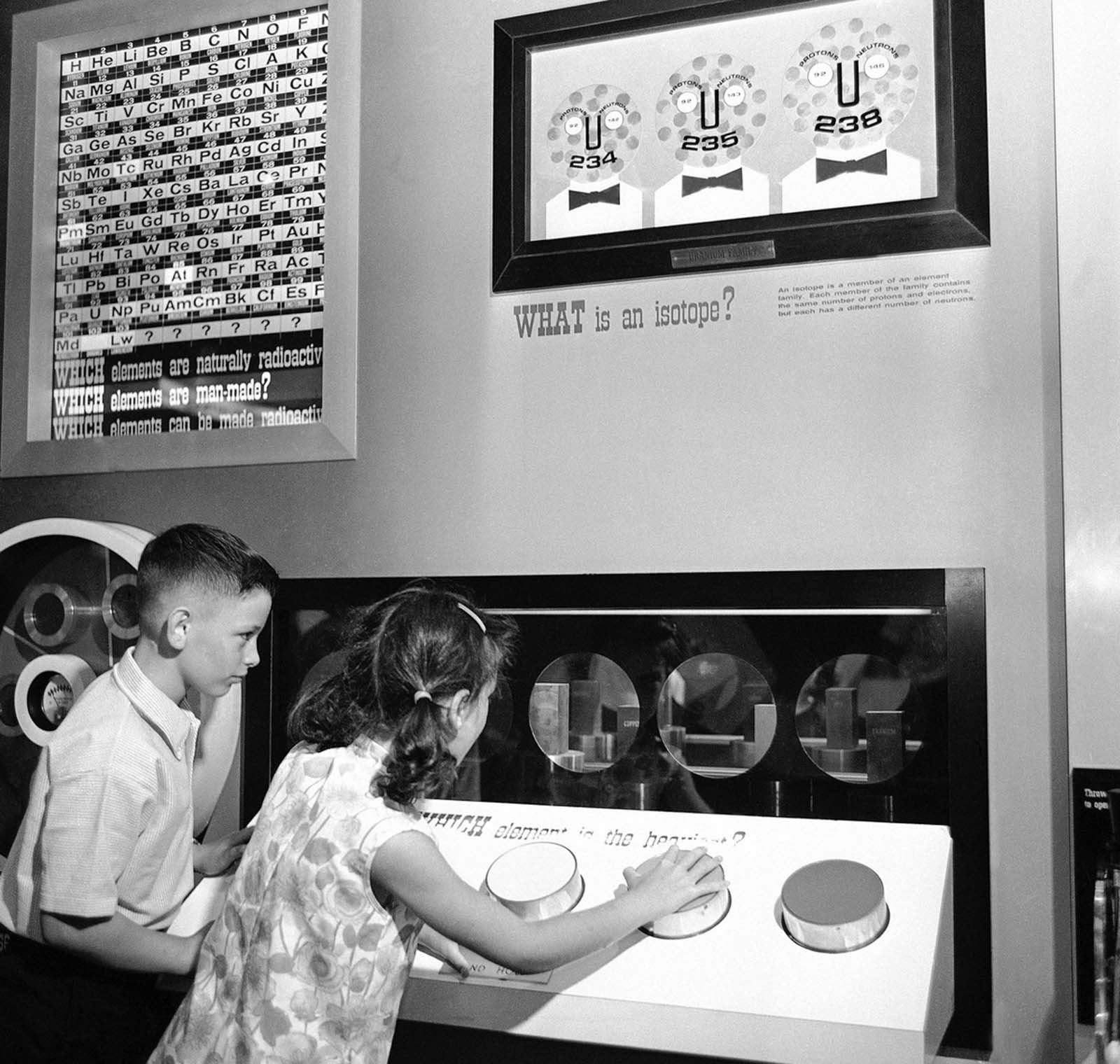 One many displays designed to brief youngsters on the fundamentals of atomic energy at the Atomic Energy Commission's 