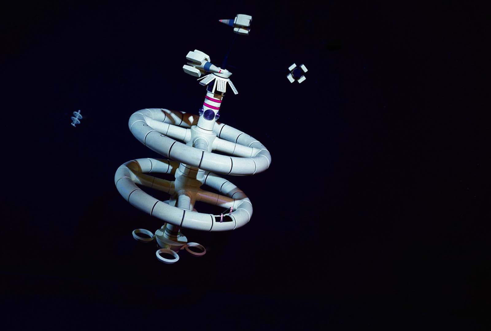 Space stations and spacecraft dot the night sky in GM's Futurama exhibit at the World's Fair.