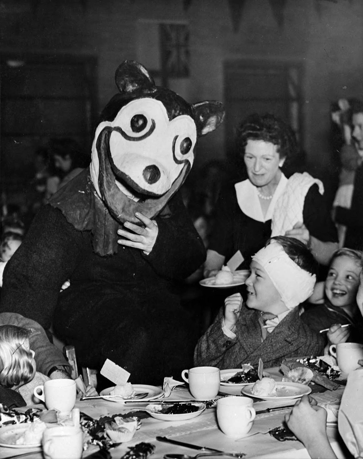 Mickie as a guest at a party given to 350 children by the 562 Battery Searchlight Regt, Streatham, London. 1947.