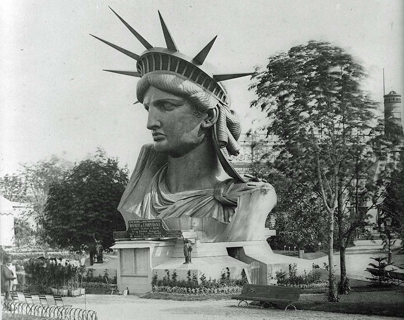 The head of the Statue of Liberty, on display in a park in Paris, France, in 1883.