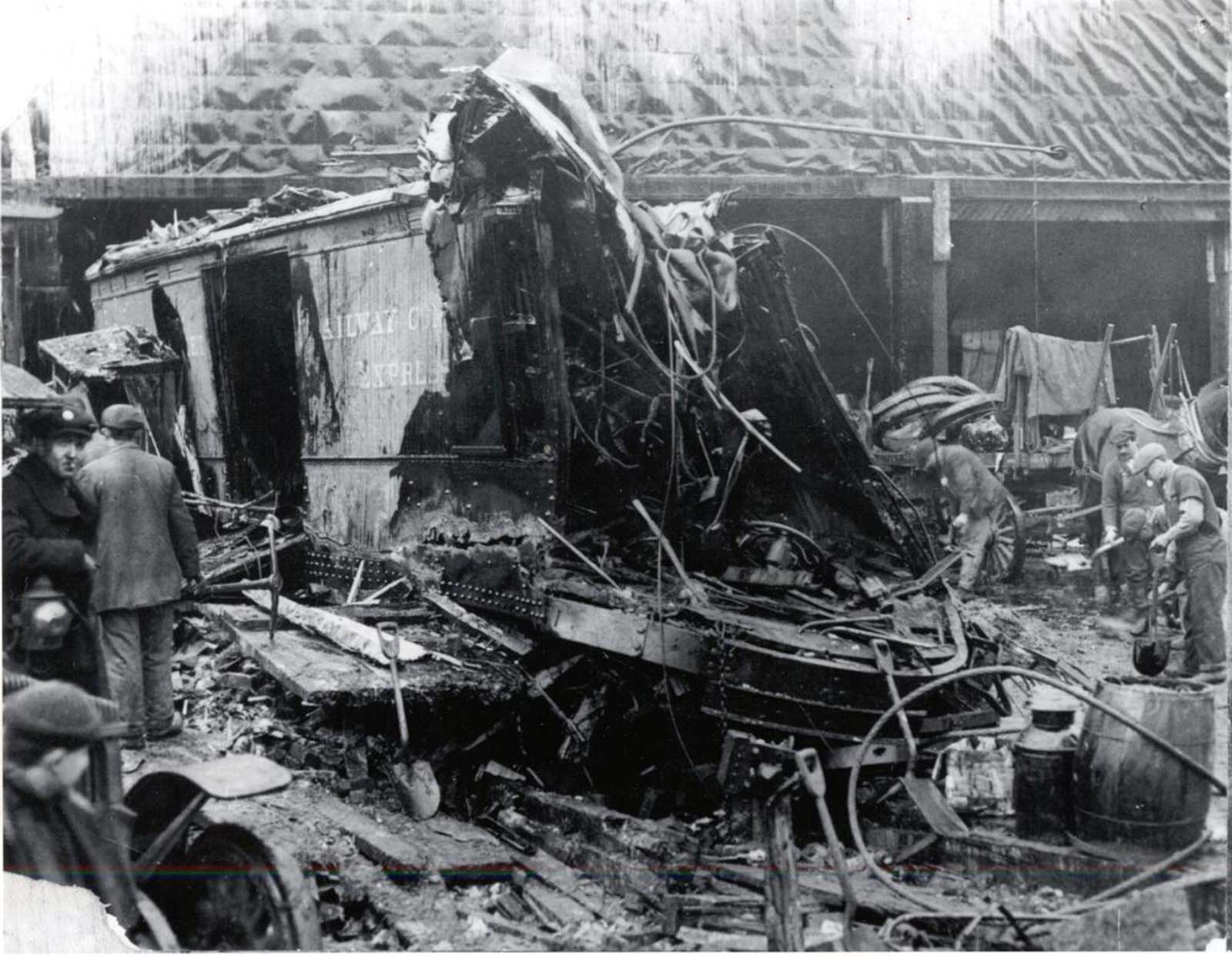 Debris was strewn about the street outside the freight house of the Bay State Street Railway Co. The rising tide of molasses leveled buildings and buckled the steel girders of the elevated railway, overwhelming everything and everyone in its wake.