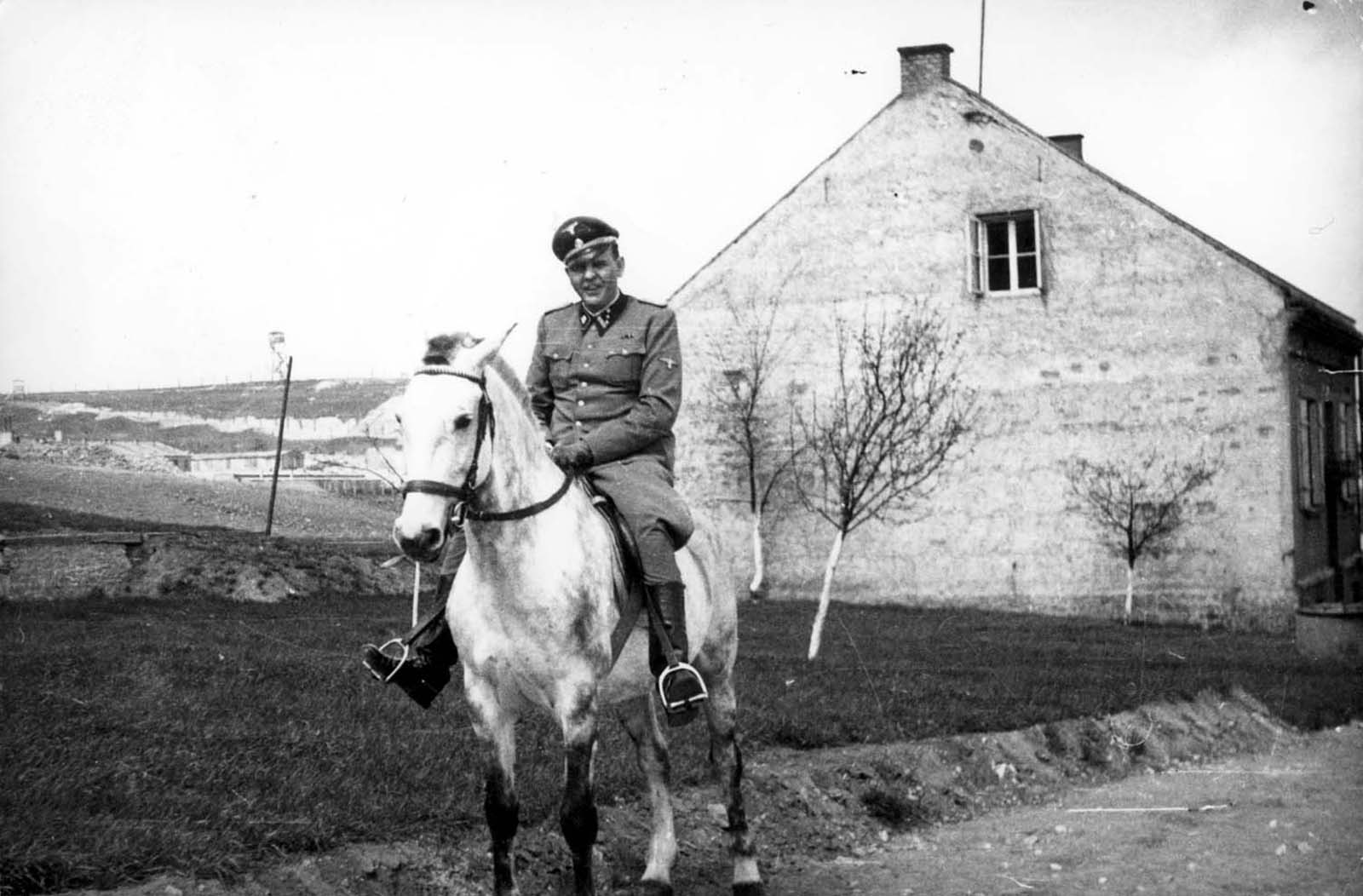 Camp Commandant Amon L. Goeth, riding a horse. Plaszow, Poland.