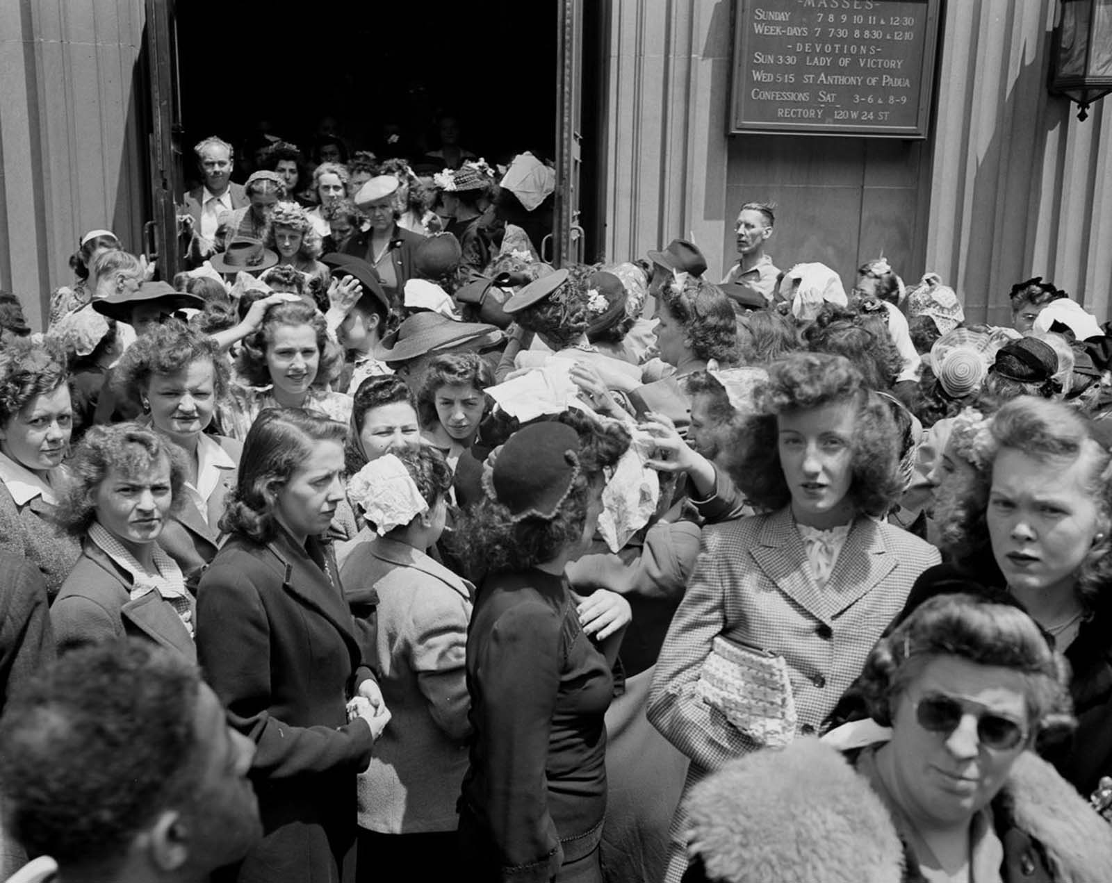 Worshippers outside St. Vincent de Paul's church.