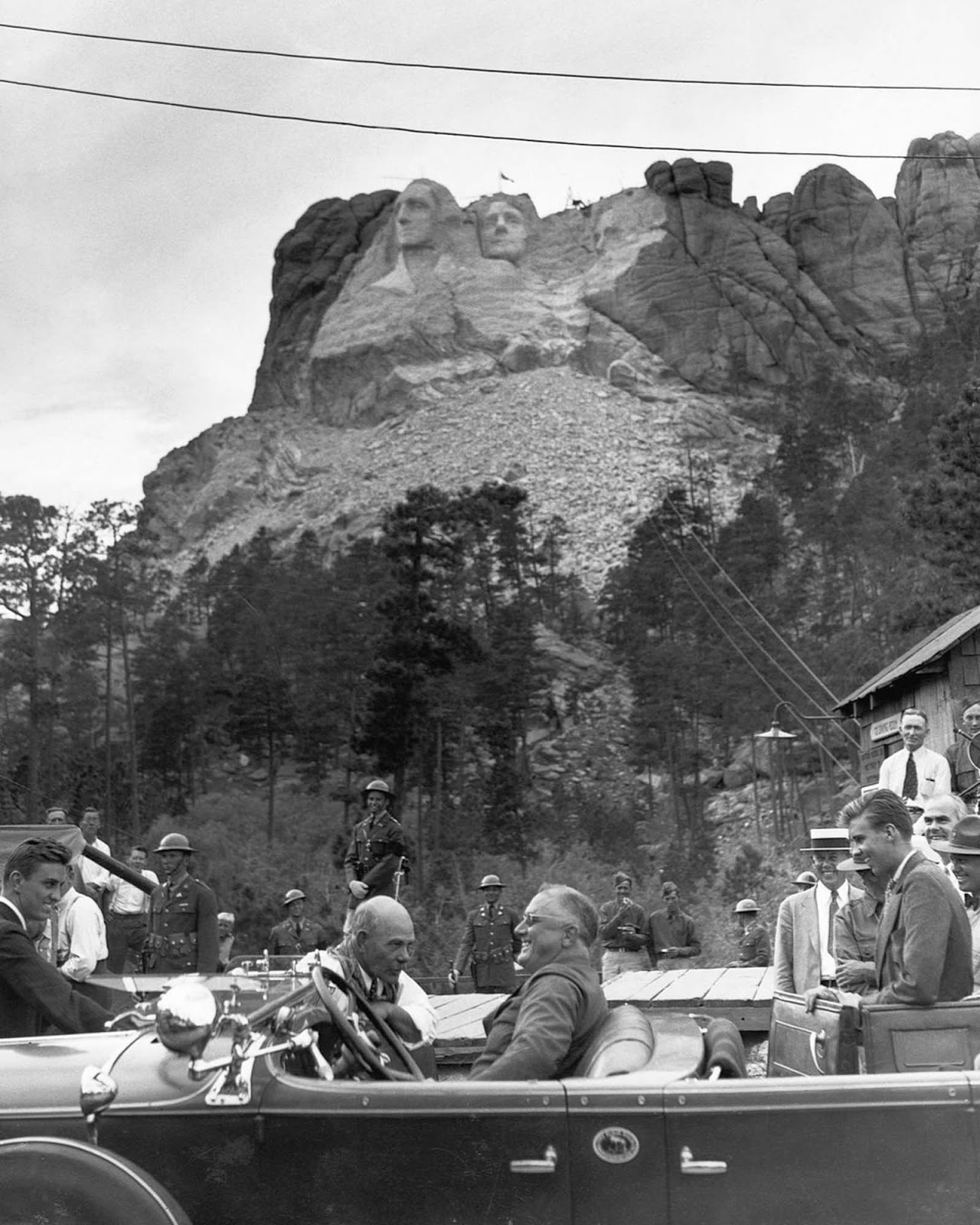 President Franklin Roosevelt visits Mount Rushmore to dedicate the sculpture of Thomas Jefferson. 1936.