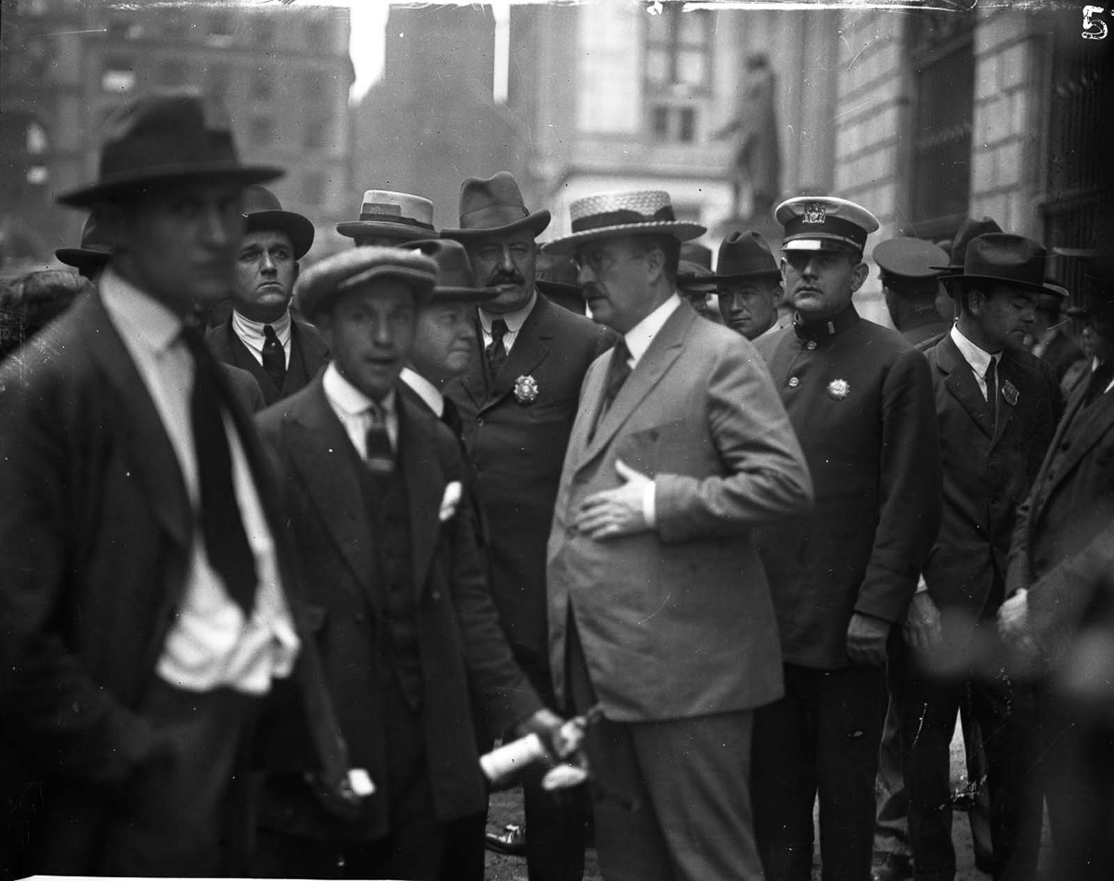 New York Mayor John Francis Hylan visits the site of the bombing two days after the explosion.