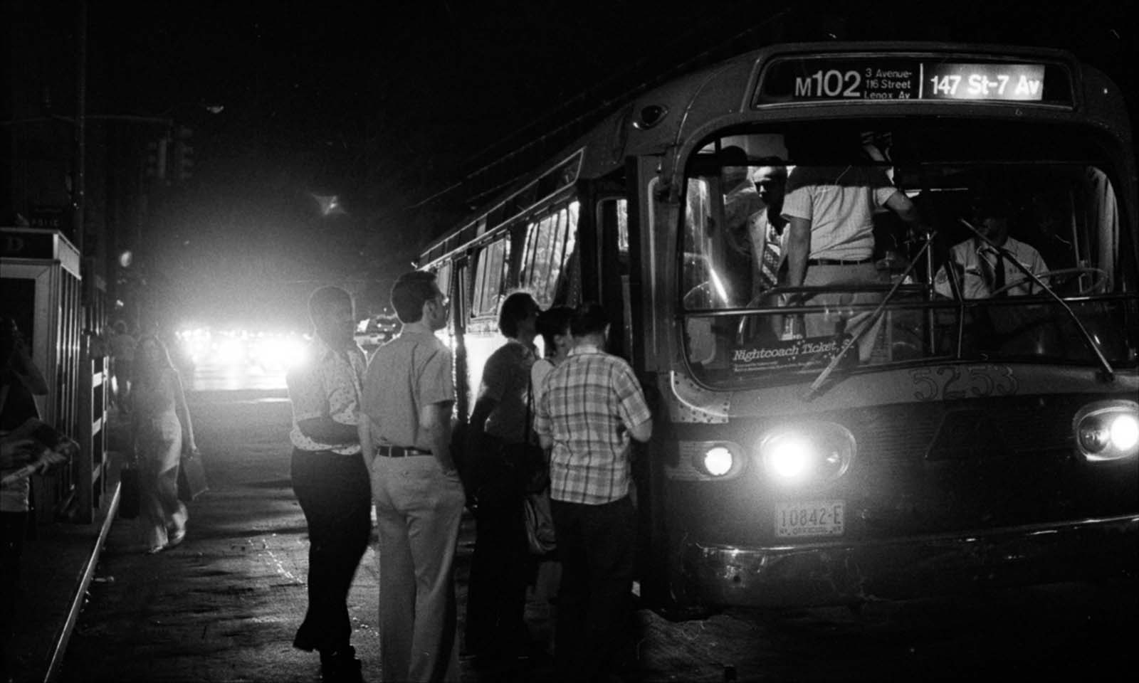 With subway service cut off, people crowd aboard a bus on Seventh Avenue.