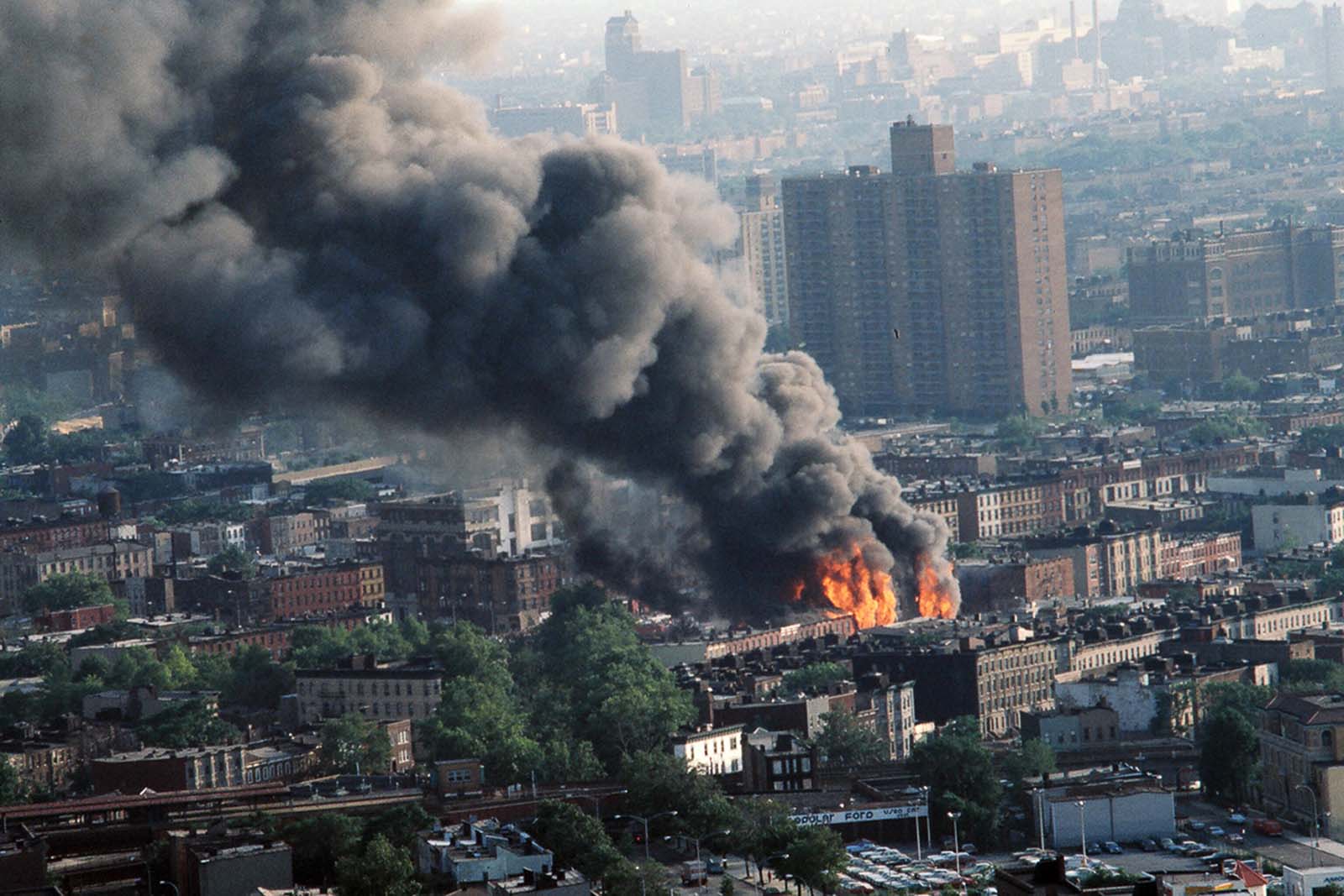 A building in Brooklyn burns as a result of arson.