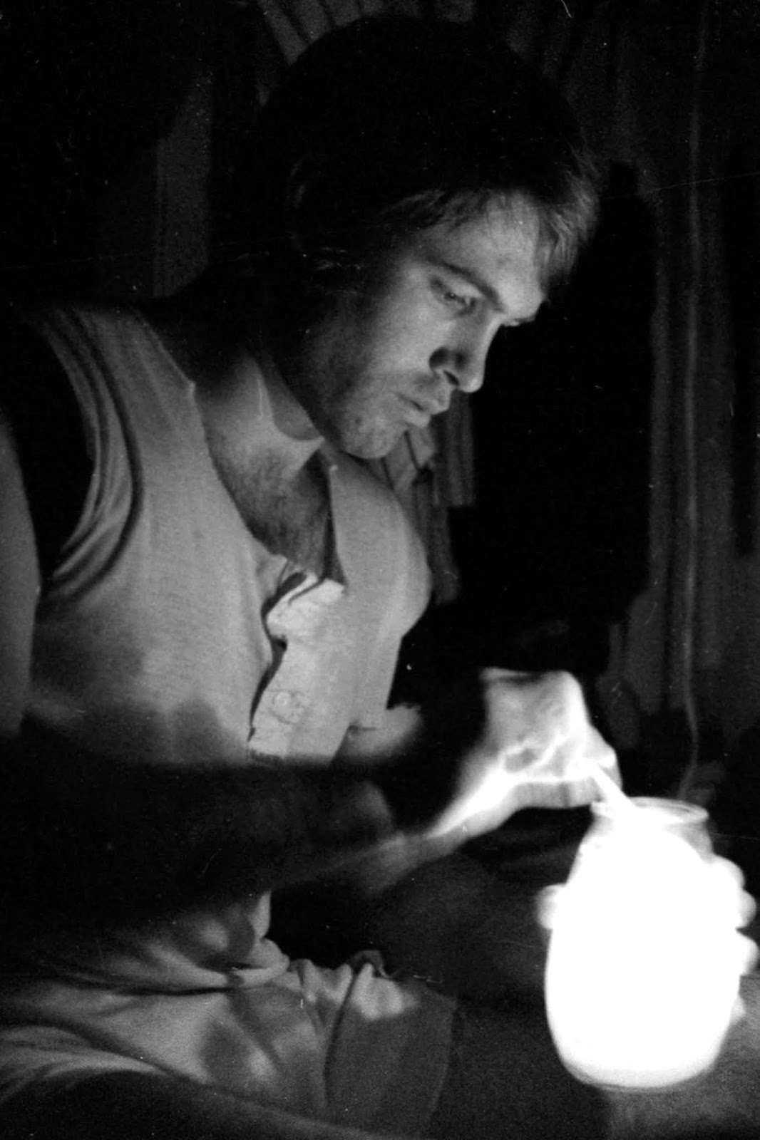 John Stearns lights a candle at Shea Stadium.