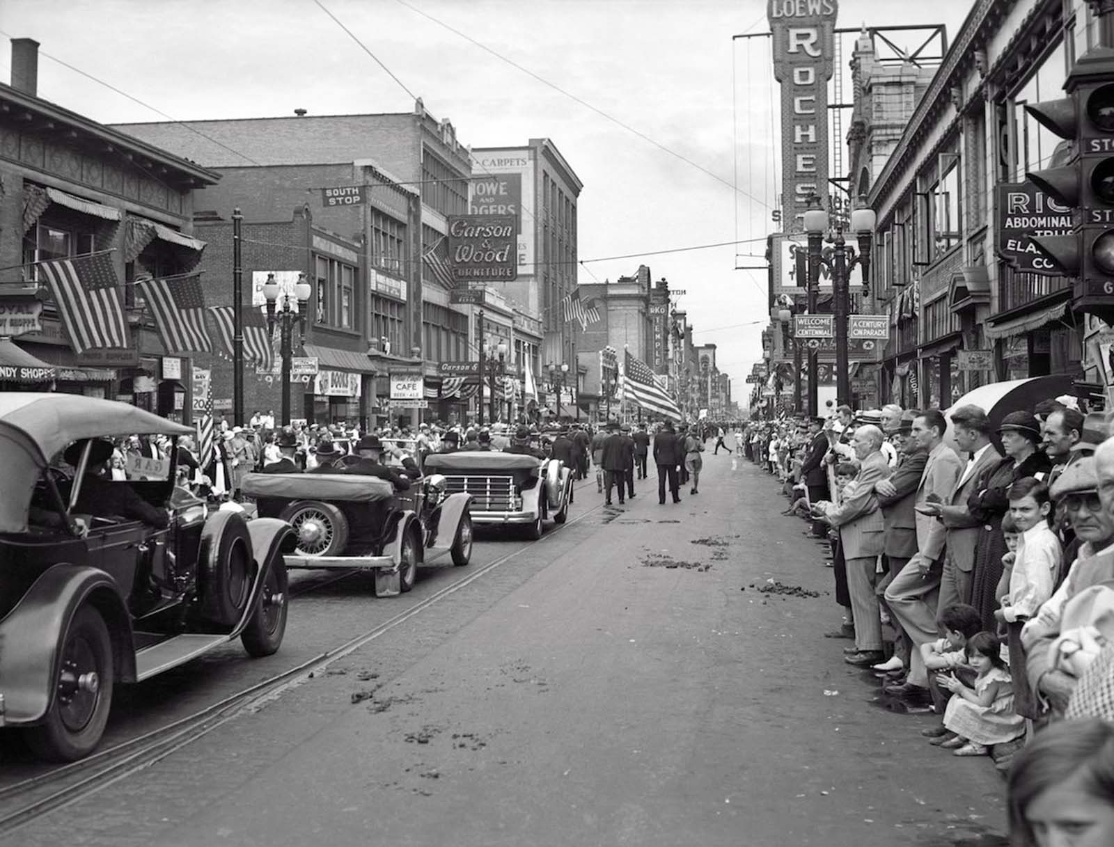 Rochester, New York — The Grand Army of the Republic Civil War Veterans join a parade down main street during Rochester's centennial. 1934.