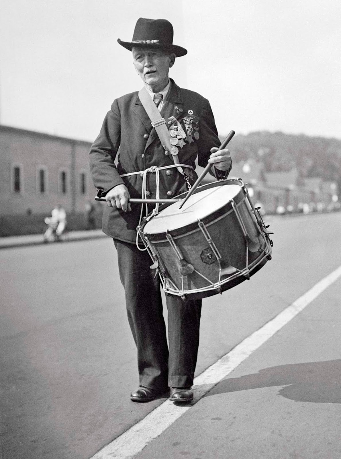 Washington, D.C. - Captain R.D. Parker, age 90, who played a drum at Lincoln's inauguration, as he took part in the final parade of the Grand Army of the Republic in Washington, D.C., closing the 70th annual encampment. The Grand Army of the Republic was an organization founded in 1866 for veterans of the Civil War. 1936.