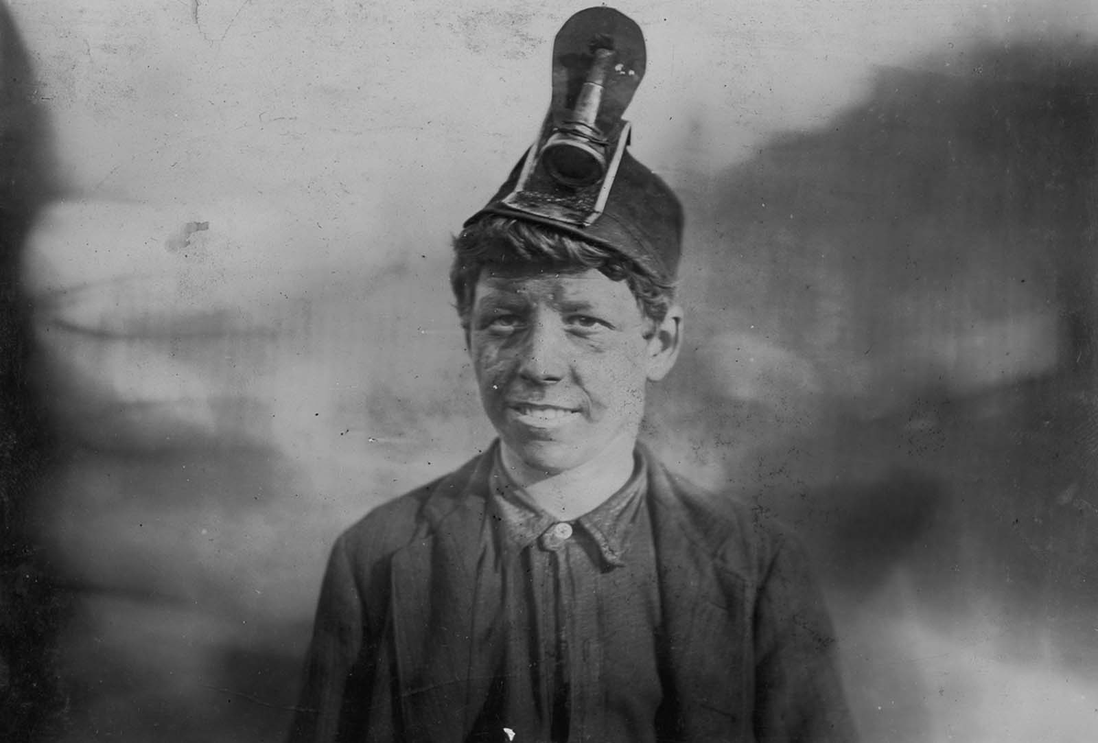 Frank, age 14. He had been working in a mine for three years and had been hospitalized for a year when his leg was crushed by a coal car. 1906.