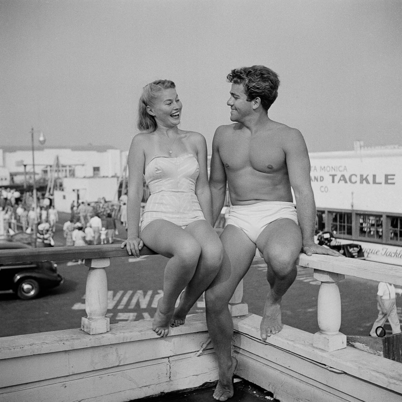 A happy couple showing off.