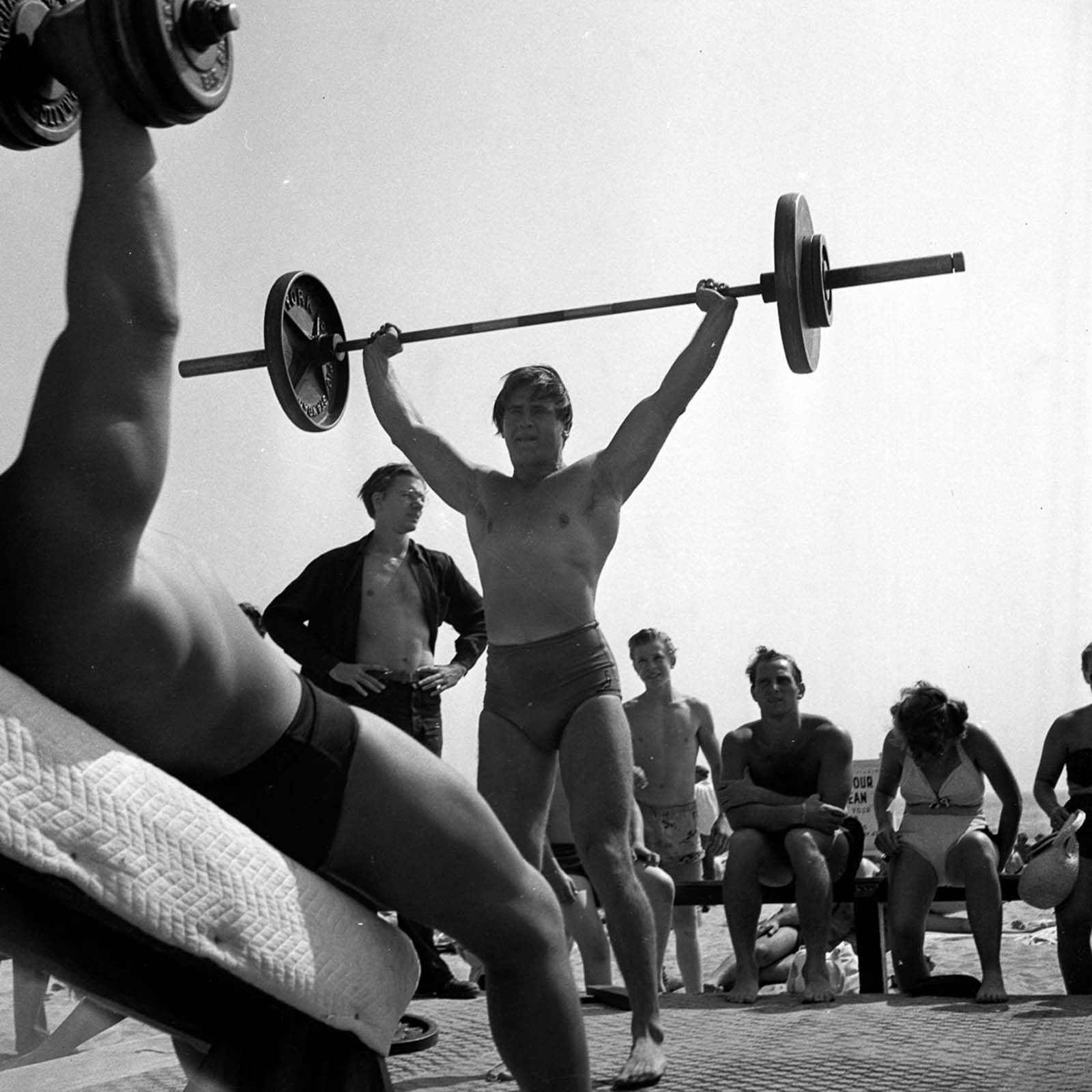 A bodybuilder would have called the bodies at Muscle Beach in the ‘30’s “Functional Physiques.” Lean and hard, but not with the kind of size that heavy weight training earns a man. Still, it was enough to make them stand out from the Average Joe.