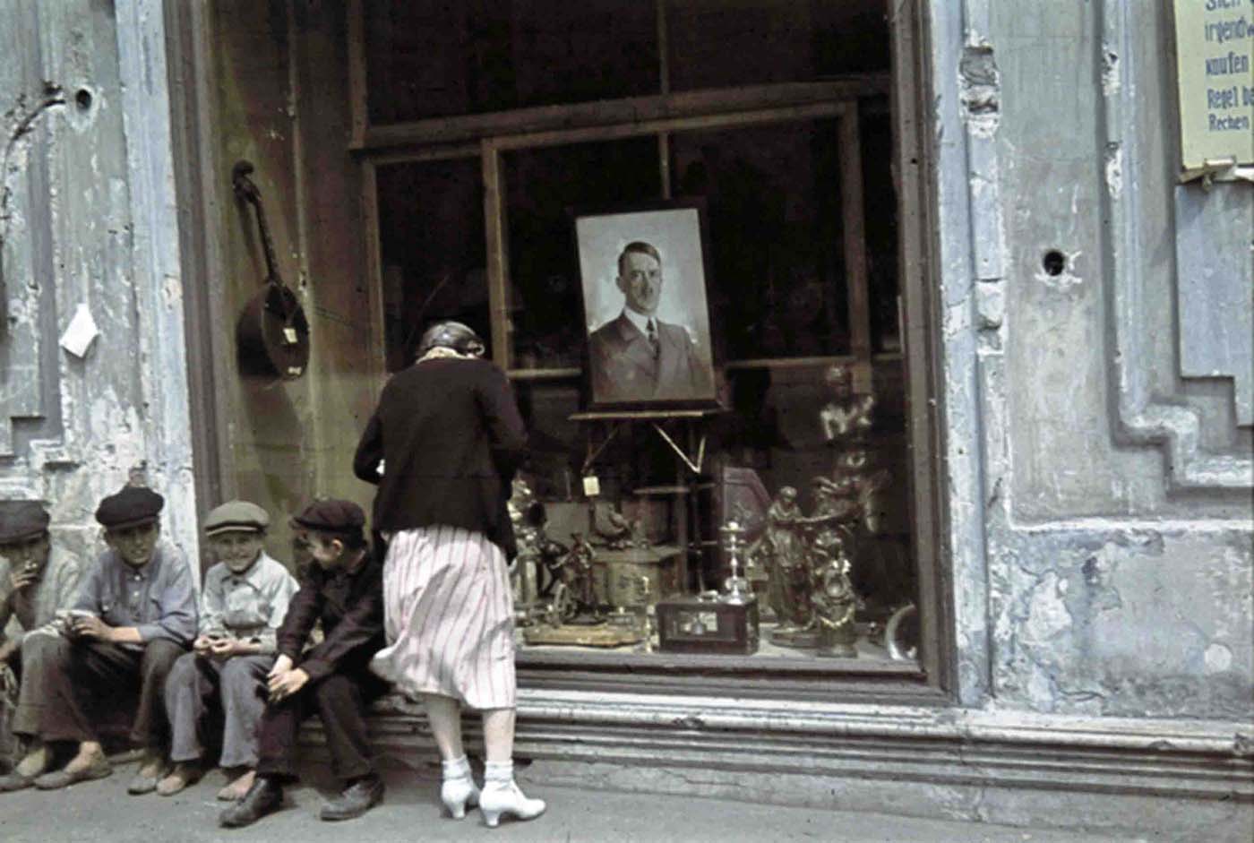 Portrait of Adolf Hitler in a shop window.