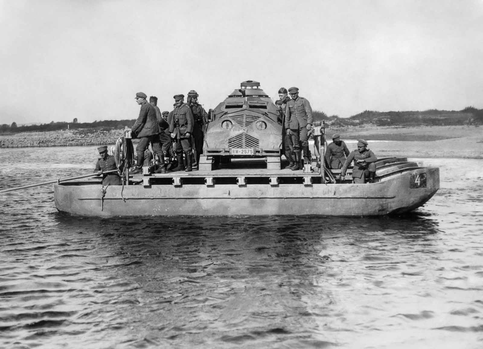 German troops ferry a dummy tank across the river Oder during military exercises. 1932.