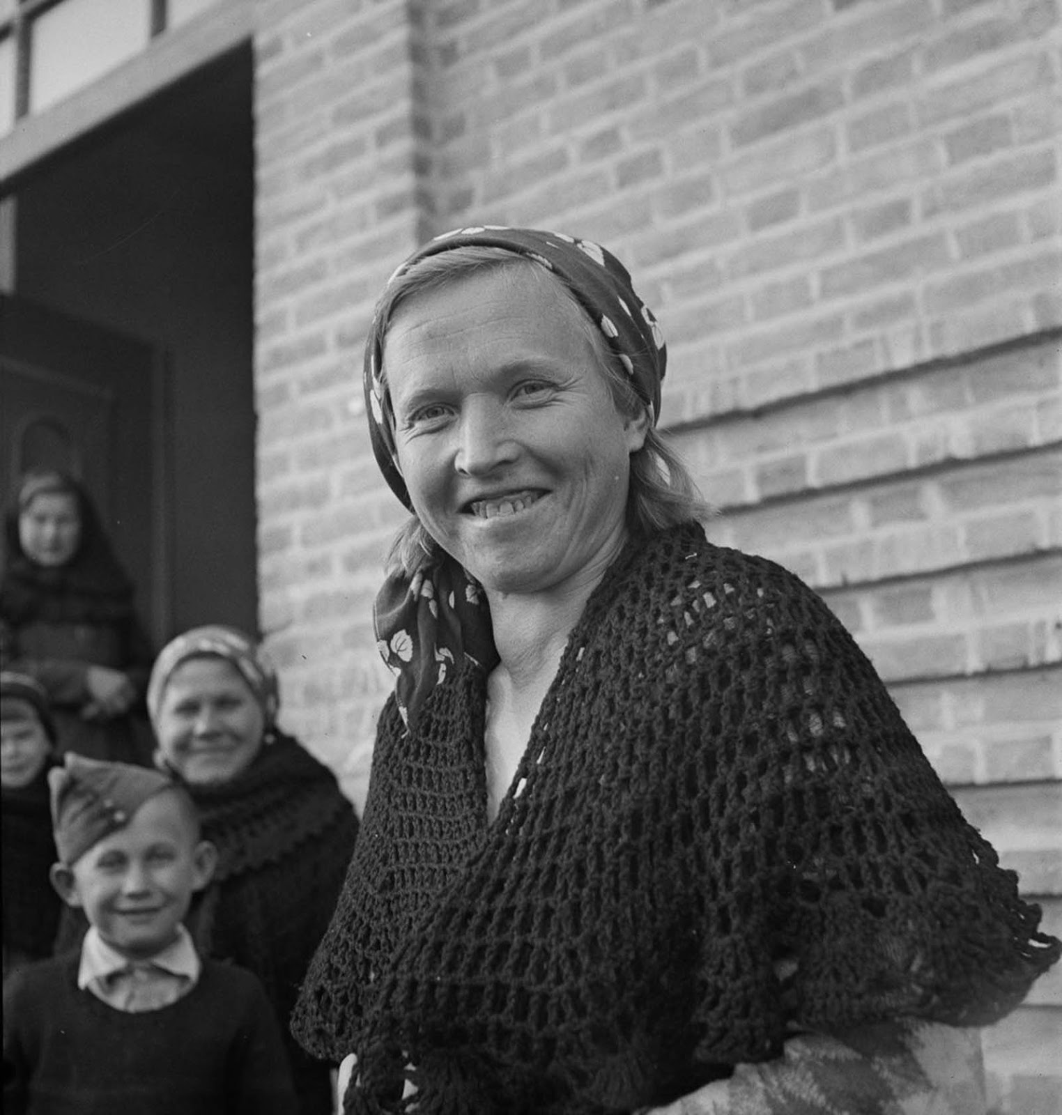 A Polish woman smiling to the camera.