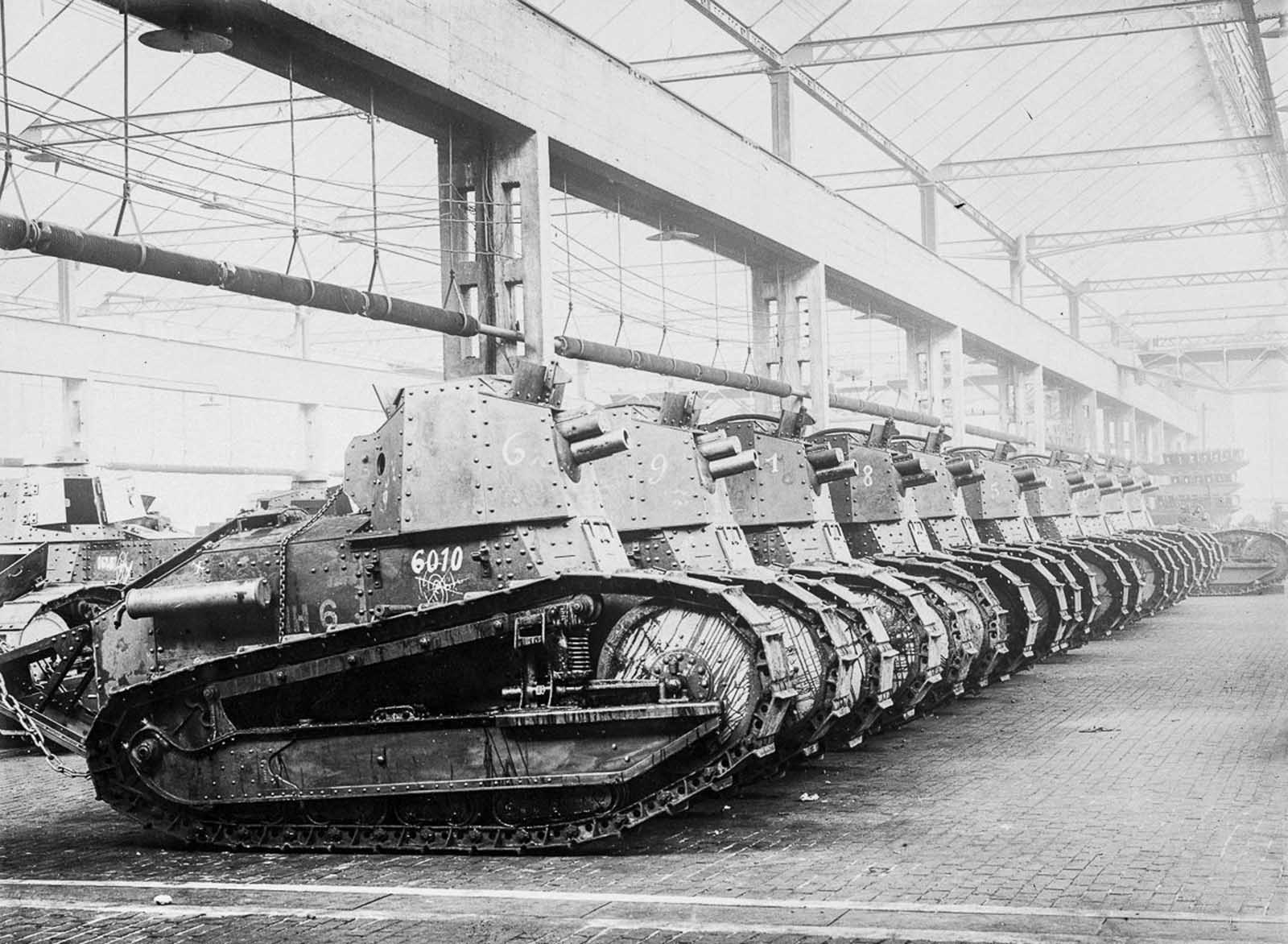 Early Renault tanks built for combat in World War I in a factory in France. 1916.