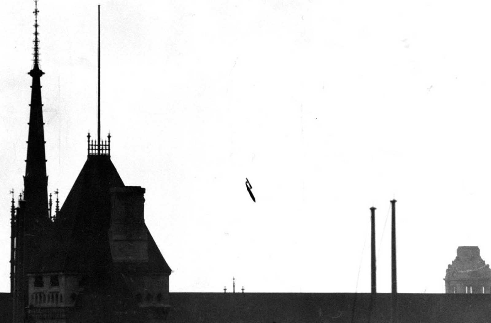 Across the Channel, Britain was being struck by continual bombardment by thousands of V-1 and V-2 bombs launched from German-controlled territory. This photo, taken from a fleet street roof-top, shows a V-1 flying bomb 
