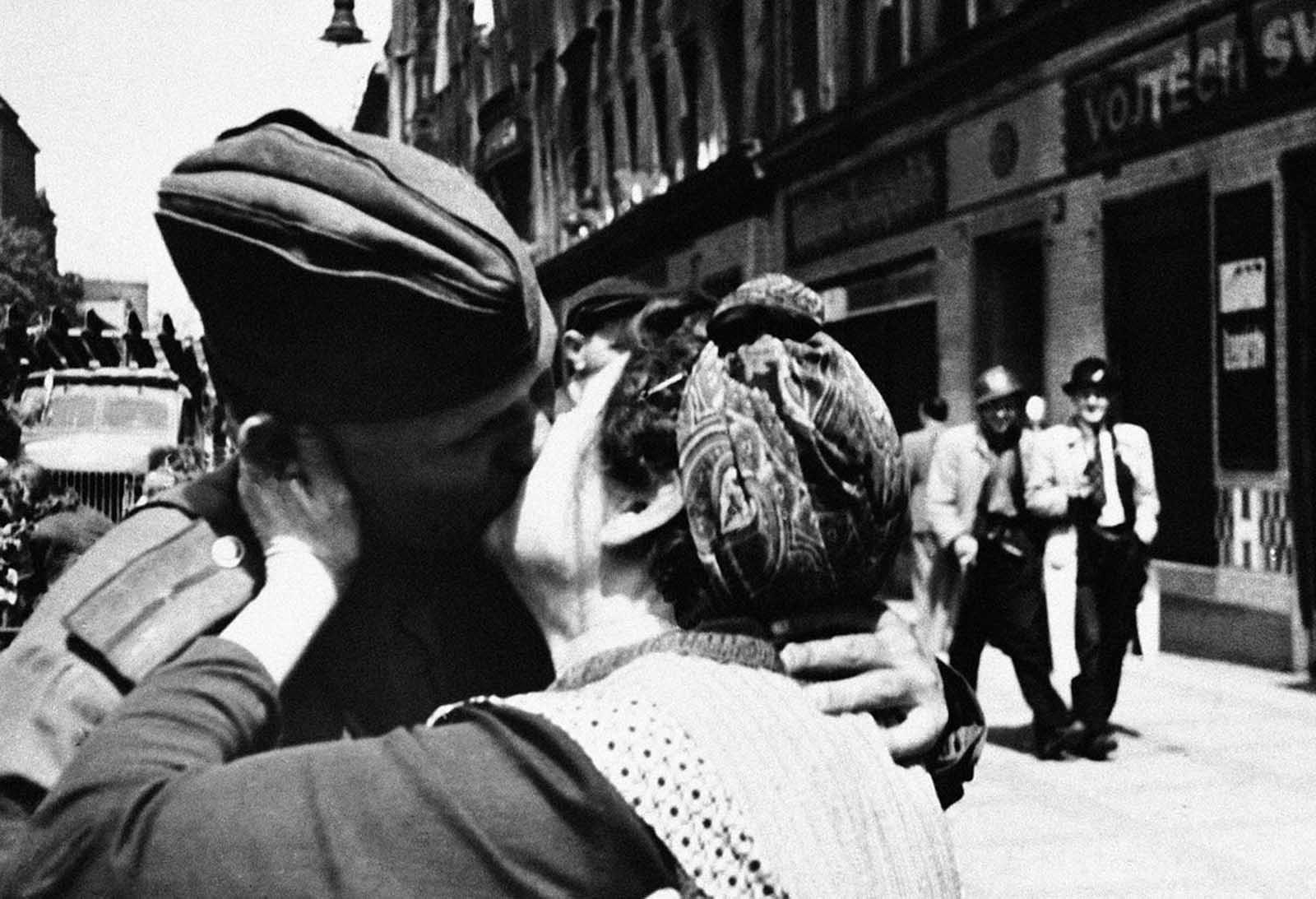 Overwhelmed with emotion, this Czech mother kisses a Russian soldier in Prague, Czech Republic on May 5, 1945, thanking one who fought to free her beloved home.
