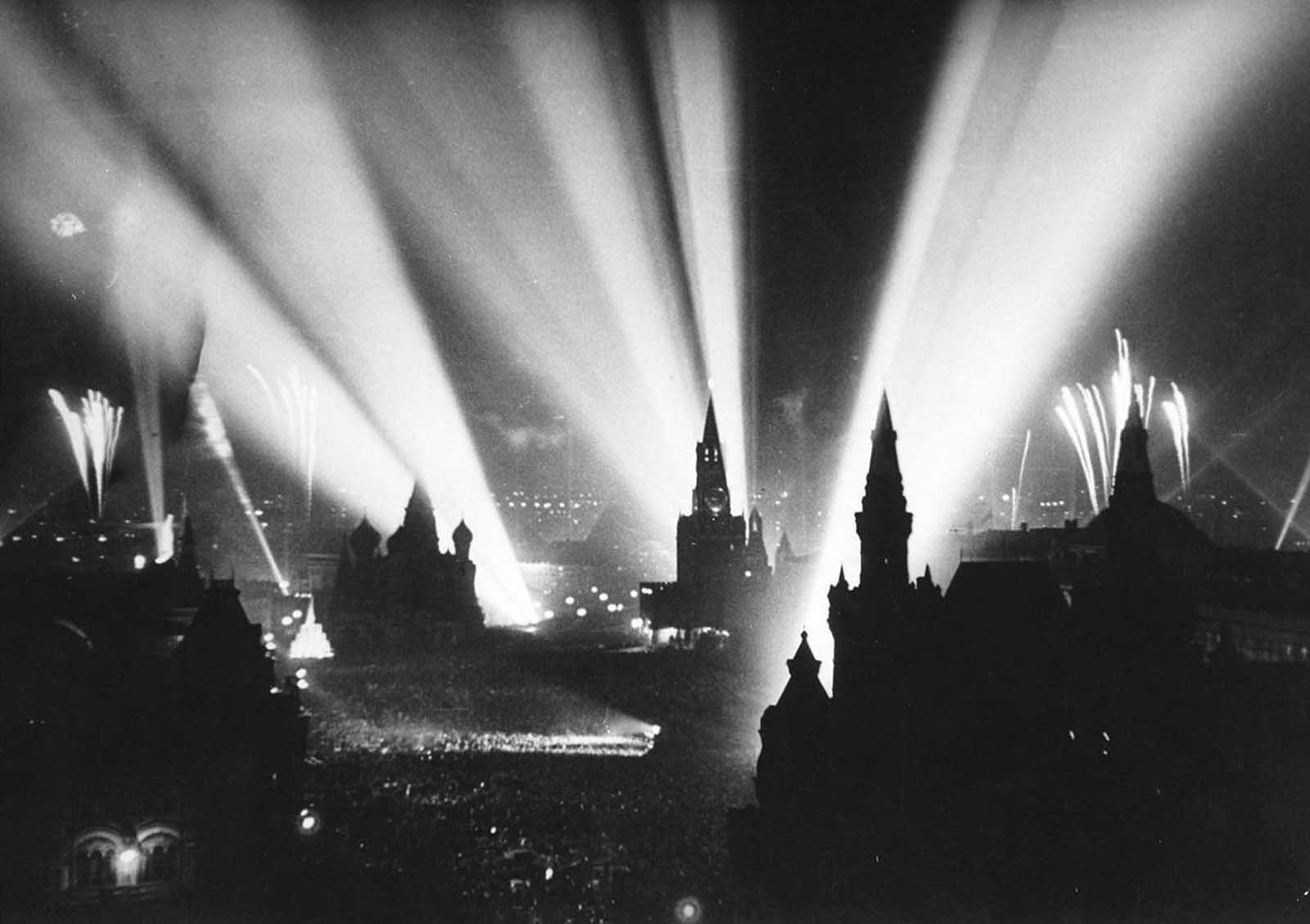 Celebration of Victory in Moscow's Red Square, in the Soviet Union. Fireworks began on May 9, 1945, followed by bursts of gunfire and a sky illuminated by searchlights. 