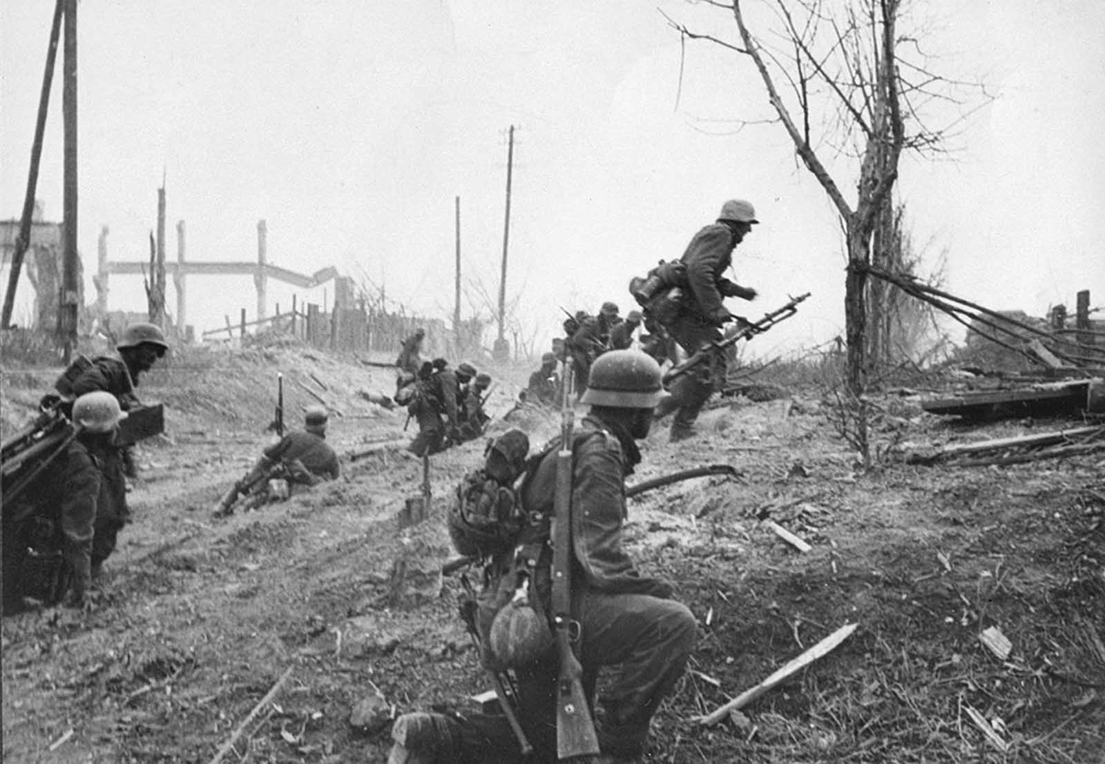 German soldiers advance outside Stalingrad late in 1942.