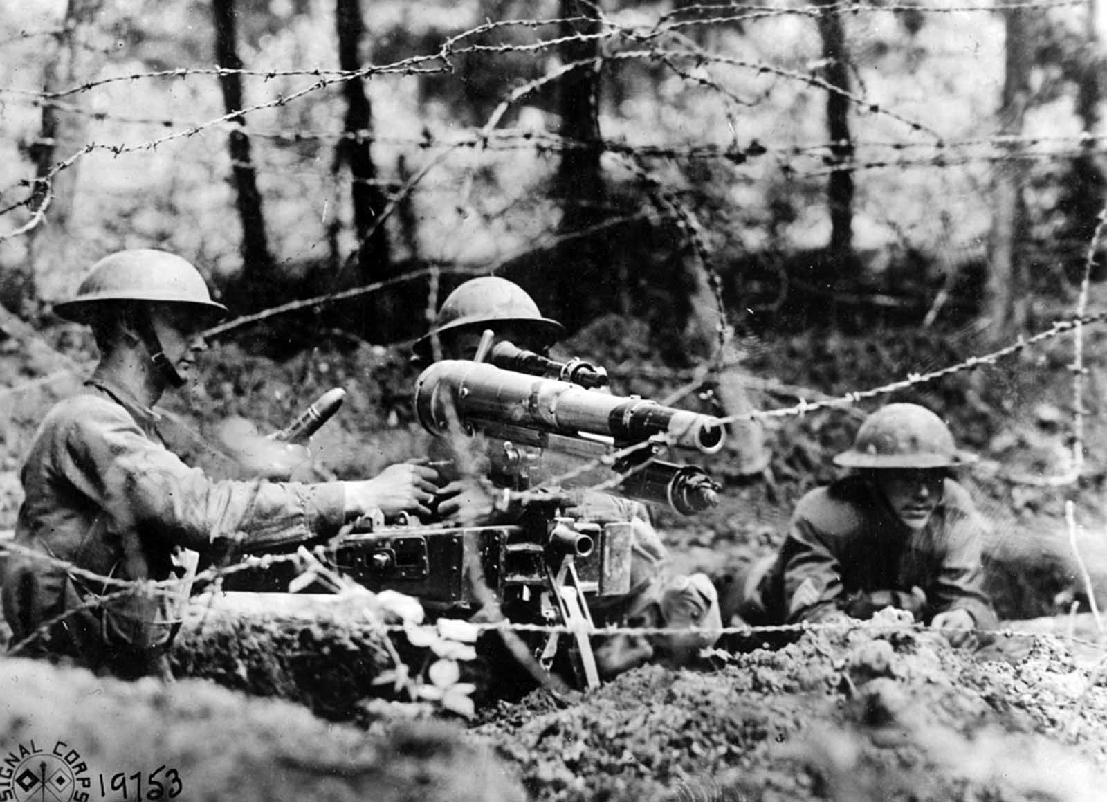 Americans setting up a French 37mm gun known as a