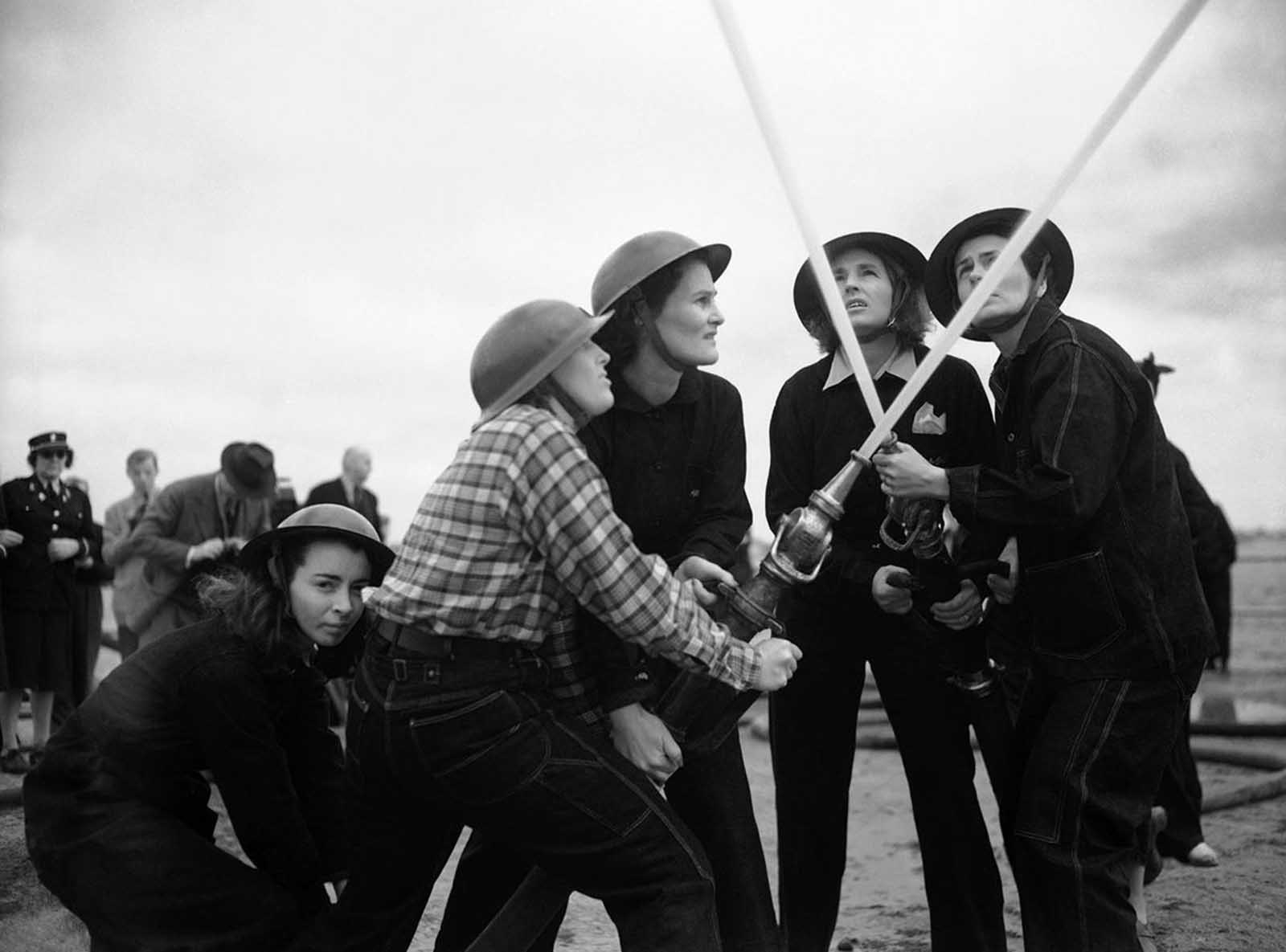 Women of the defense corps form a