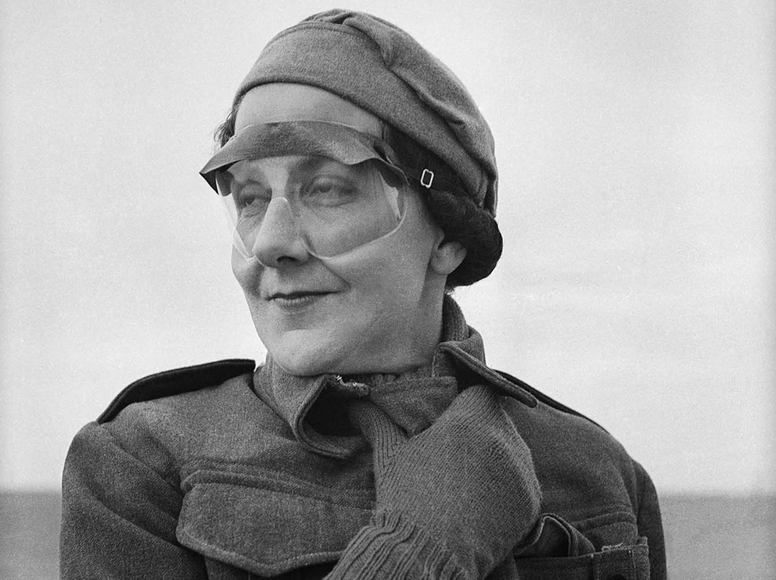 Miss Jean Pitcaithy, a nurse with a New Zealand Hospital Unit stationed in Libya, wears goggles to protect her against whipping sands, on June 18, 1942.