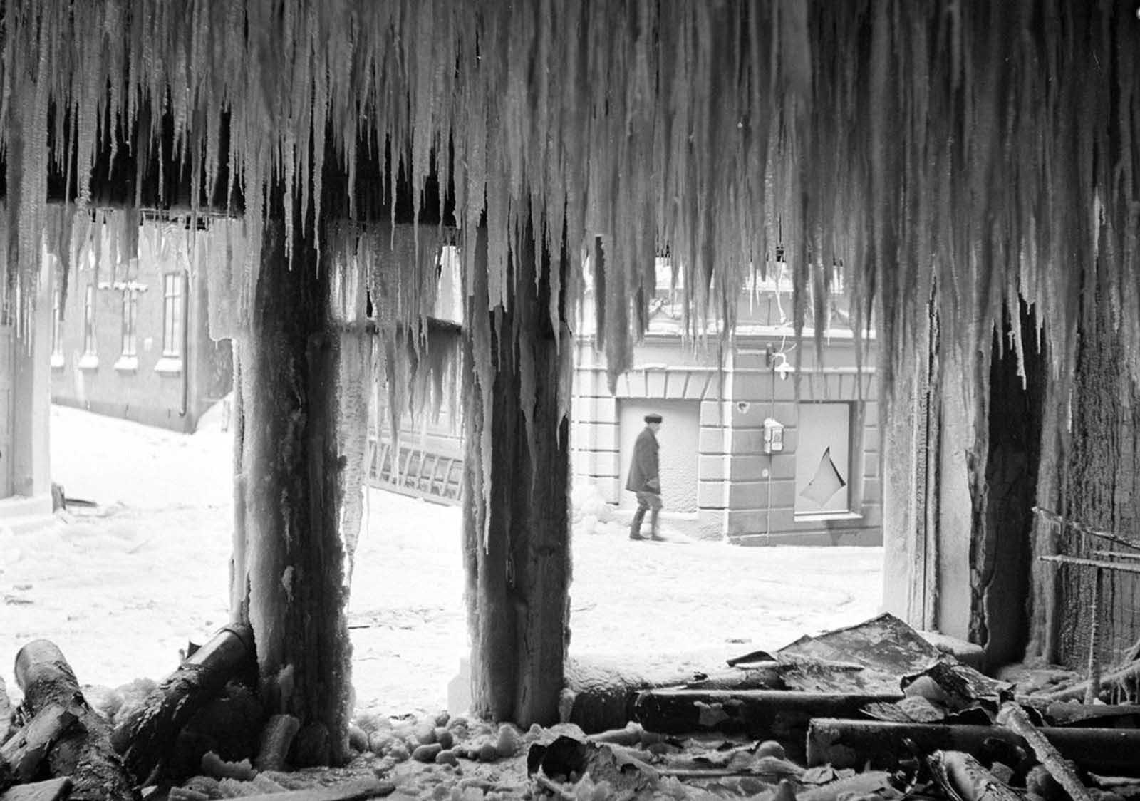 Icicles hang inside a bombed-out building in Viipuri, Finland (now Vyborg, Russia).