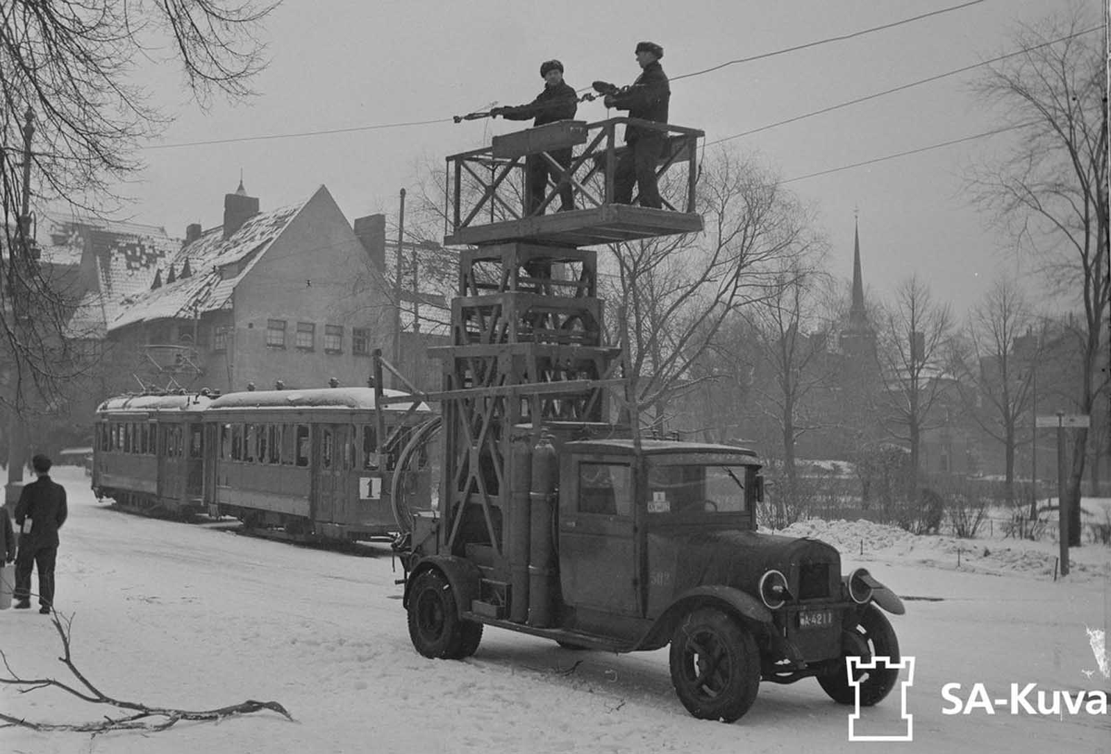 Destroyed by bombing, tram lines are repaired in February of 1944.