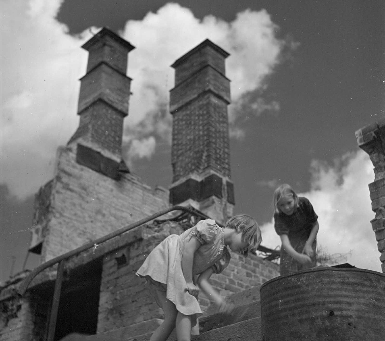 Two girls, in ruins near Martin's Church in Turku, Finland.