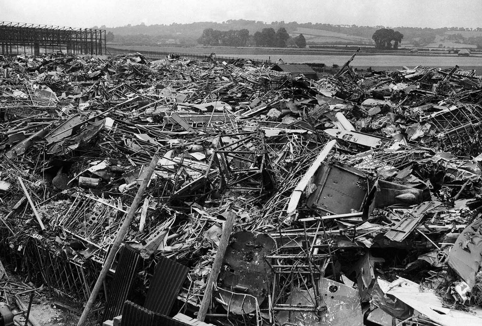A huge scrap heap where German planes, brought down over Great Britain, were dumped, photographed on August 27, 1940. The large number of Nazi planes downed during raids on Britain made a substantial contribution to the national scrap metal salvage campaign.