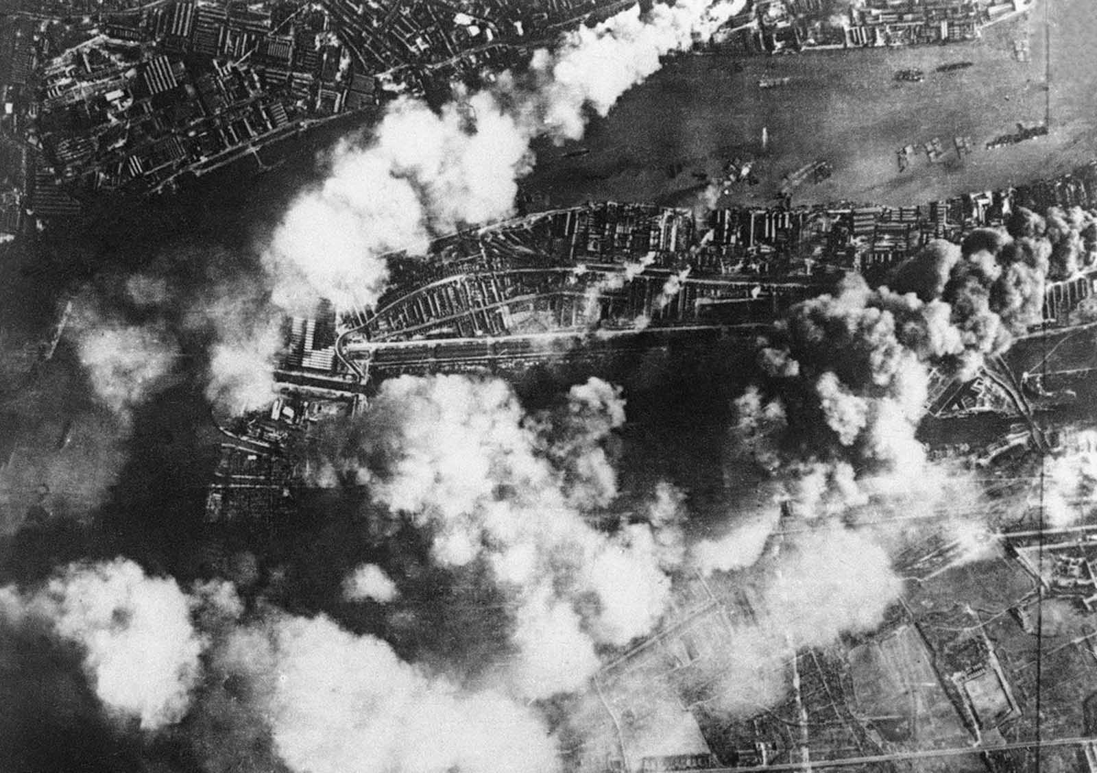 The effects of a large concentrated attack by the German Luftwaffe, on London dock and industry districts, on September 7, 1940. Factories and storehouses were seriously damaged; the mills at the Victoria Docks (below at left) show damage wrought by fire.
