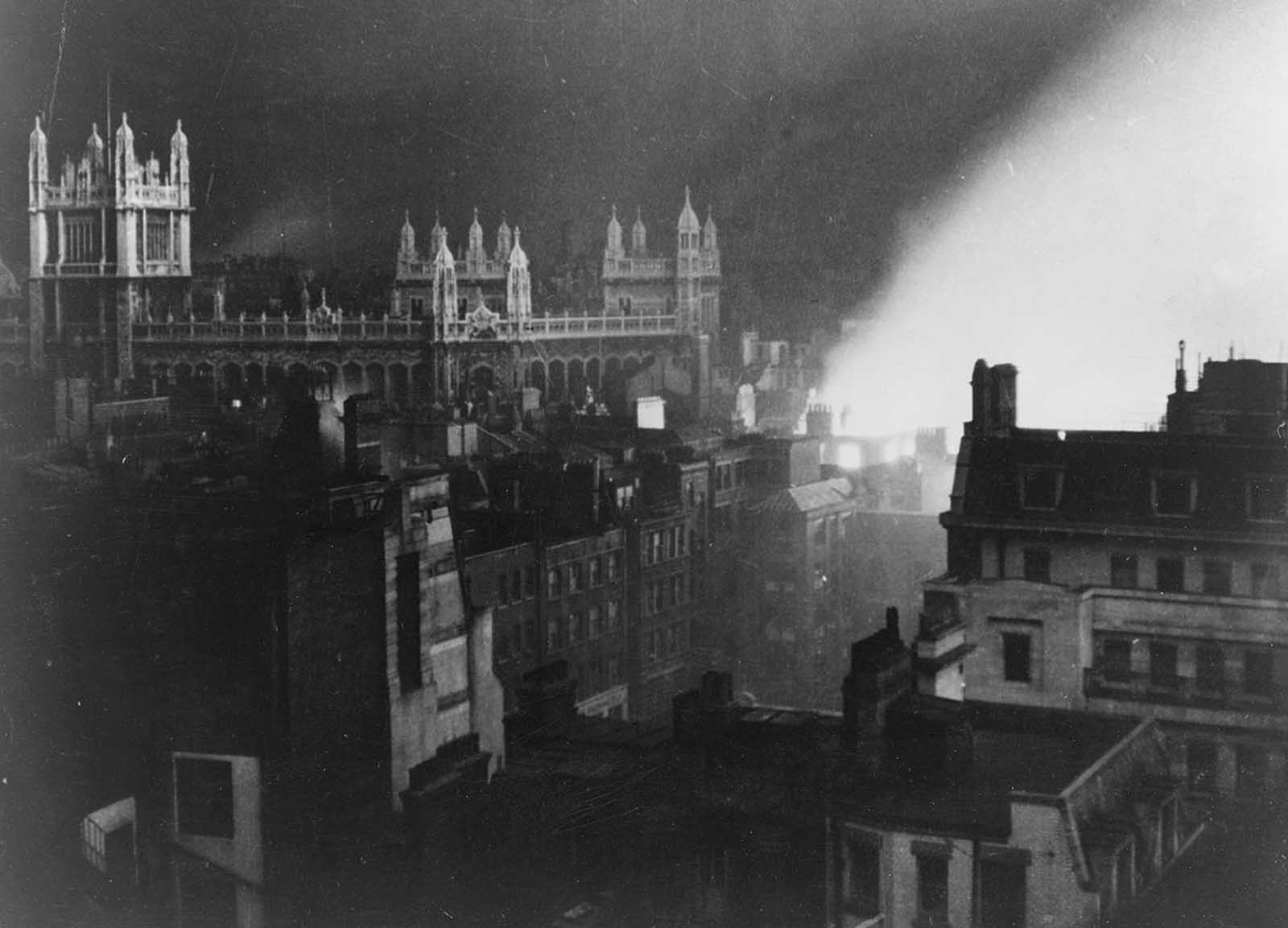 The Record Office in London, lit by flames ignited by a German air in 1940.