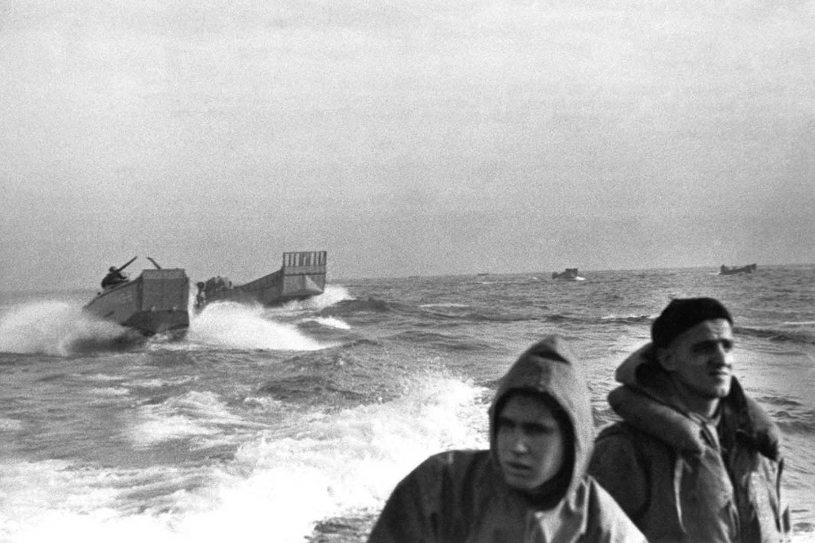 U.S. landing barges speed shoreward off Fedala, French Morocco during landing operations in early November, 1942. Fedala is about 15 miles north of Casablanca, French Moroccan city.