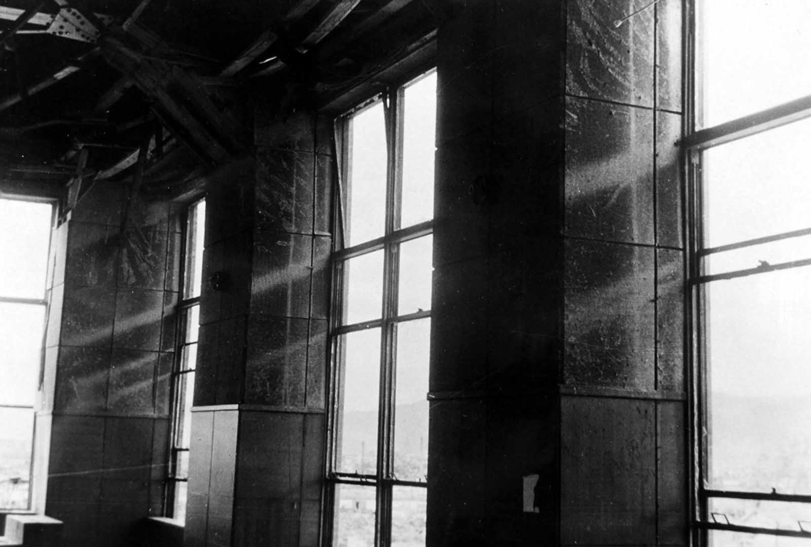 Post office savings bank, Hiroshima. Shadow of window frame left on fiberboard walls made by the flash of the detonation. October 4, 1945.