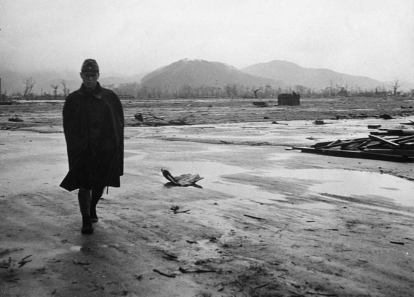 A Japanese soldier walks through a completely leveled area of Hiroshima in September 1945.